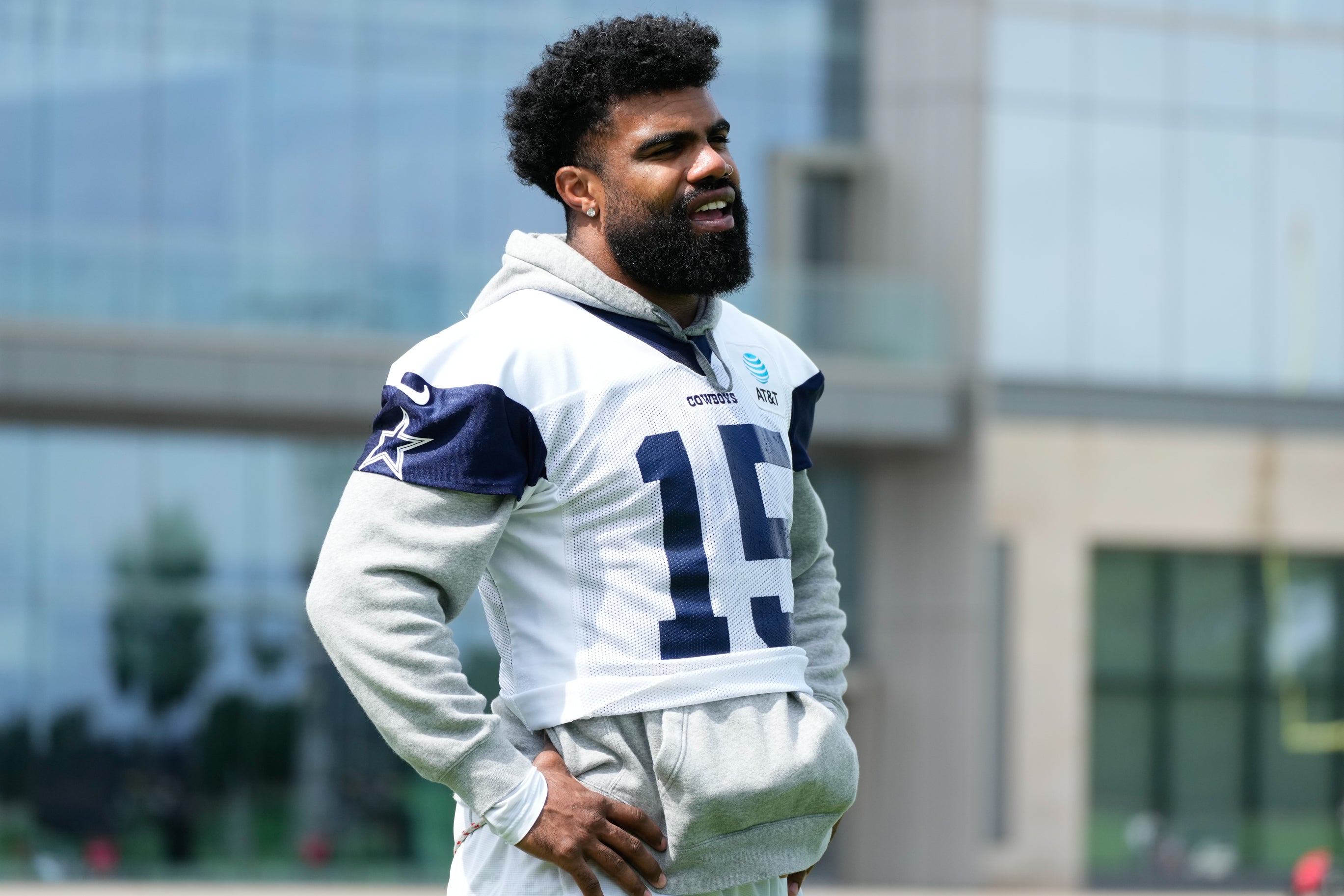 Dallas Cowboys running back Ezekiel Elliott (15) goes through a drill during practice at the Ford Center at the Star Training Facility in Frisco, Texas.
