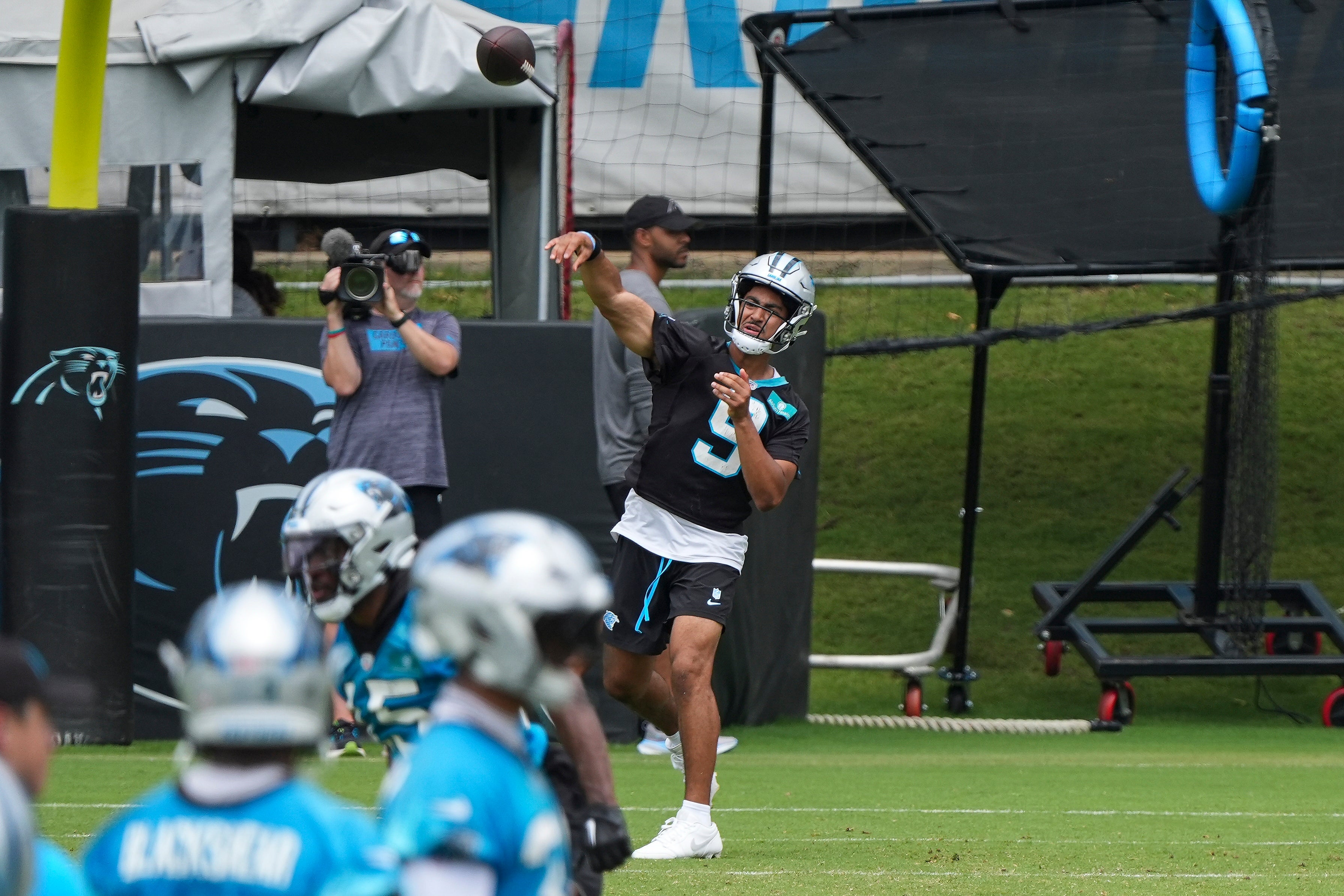 Jun 4, 2024; Charlotte, NC, USA; Carolina Panthers quarterback Bryce Young (9) throws during OTAs. Mandatory Credit: Jim Dedmon-USA TODAY Sports