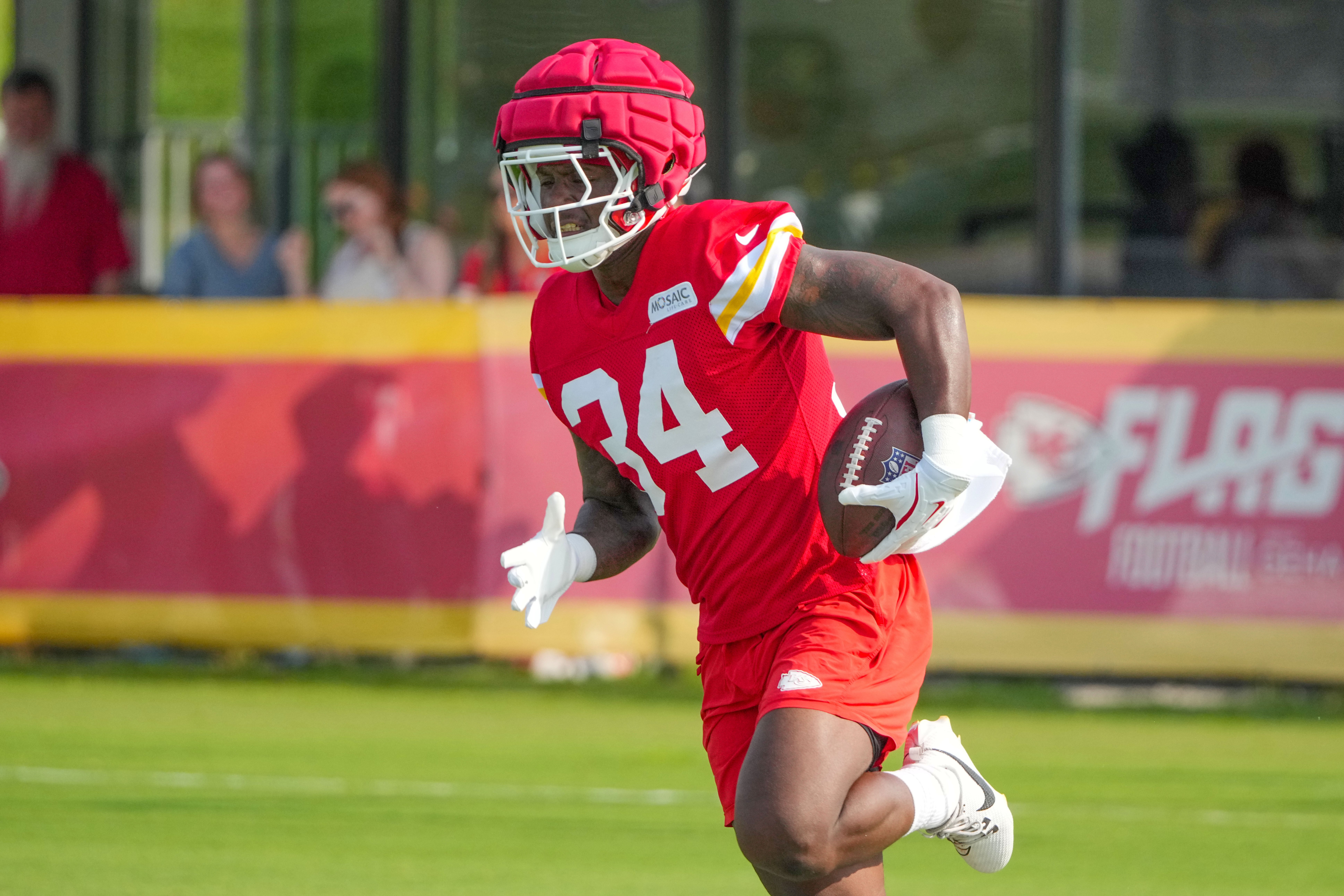 Jul 22, 2024; St. Joseph, MO, USA; Kansas City Chiefs running back Deneric Prince (34) runs the ball during training camp at Missouri Western State University.