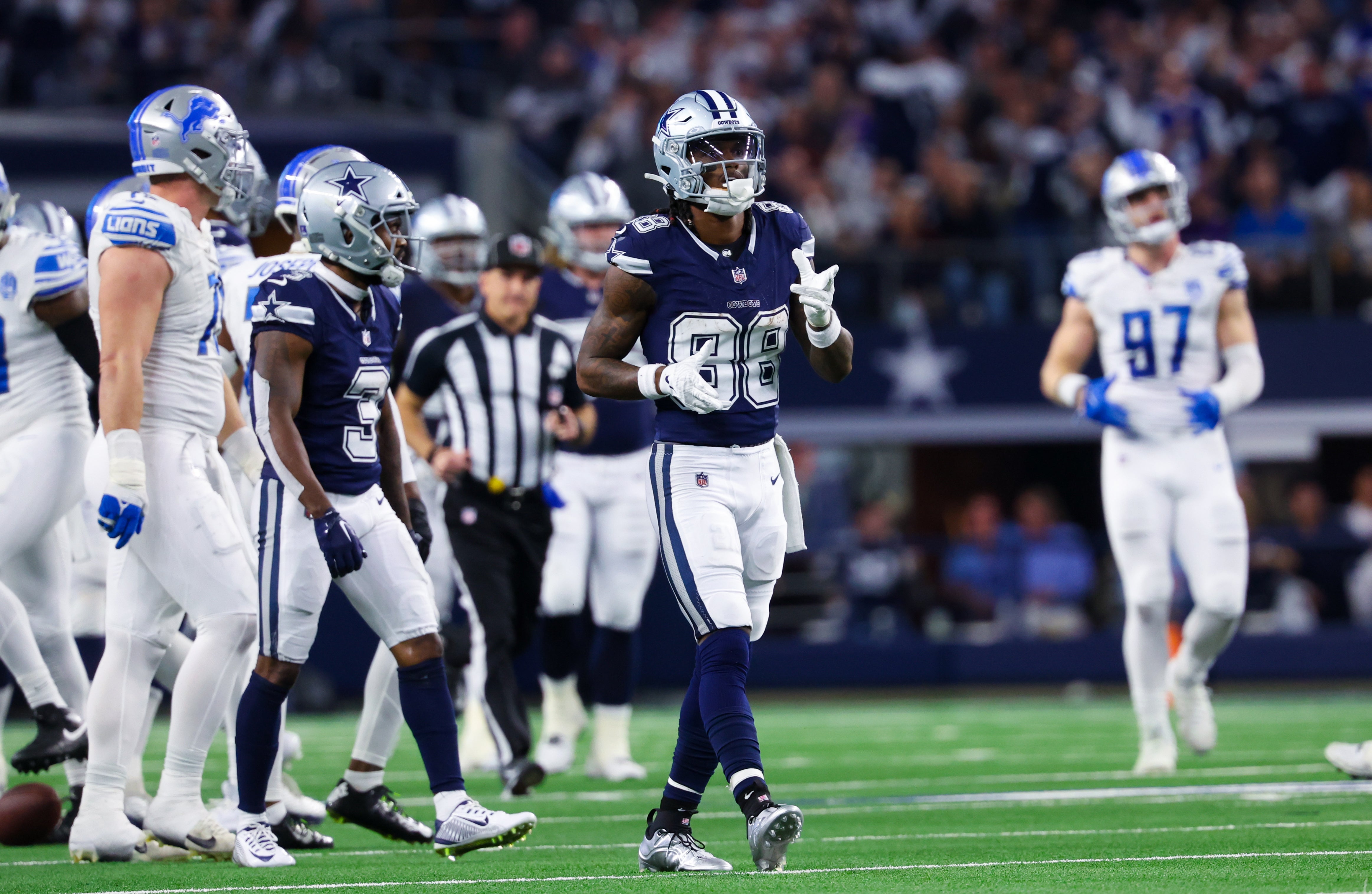 Dallas Cowboys wide receiver CeeDee Lamb (88) reacts during the second half against the Detroit Lions at AT&T Stadium.