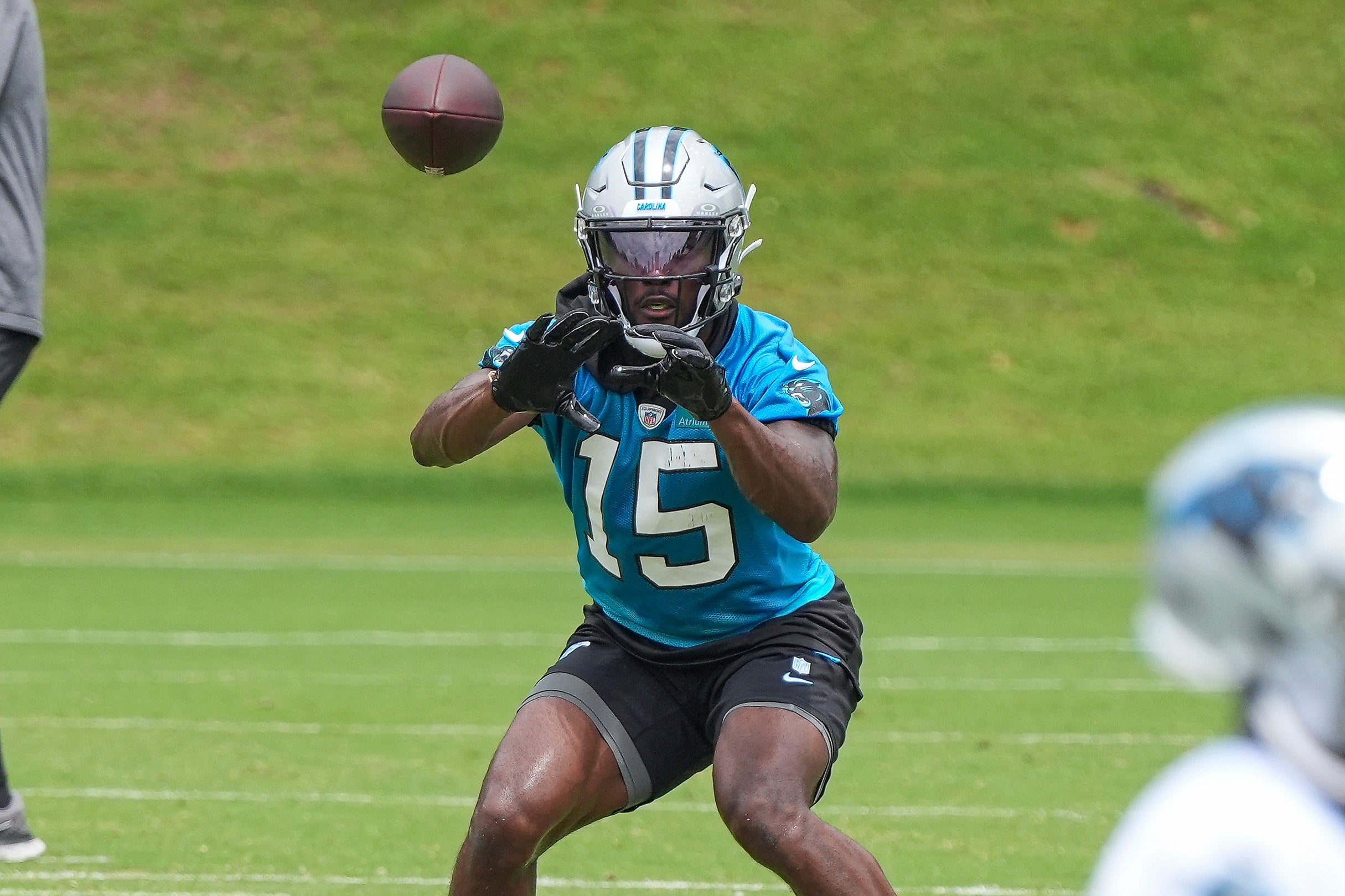 Jun 4, 2024; Charlotte, NC, USA; Carolina Panthers wide receiver Jonathan Mingo (15) makes a catch during OTAs. Mandatory Credit: Jim Dedmon-USA TODAY Sports