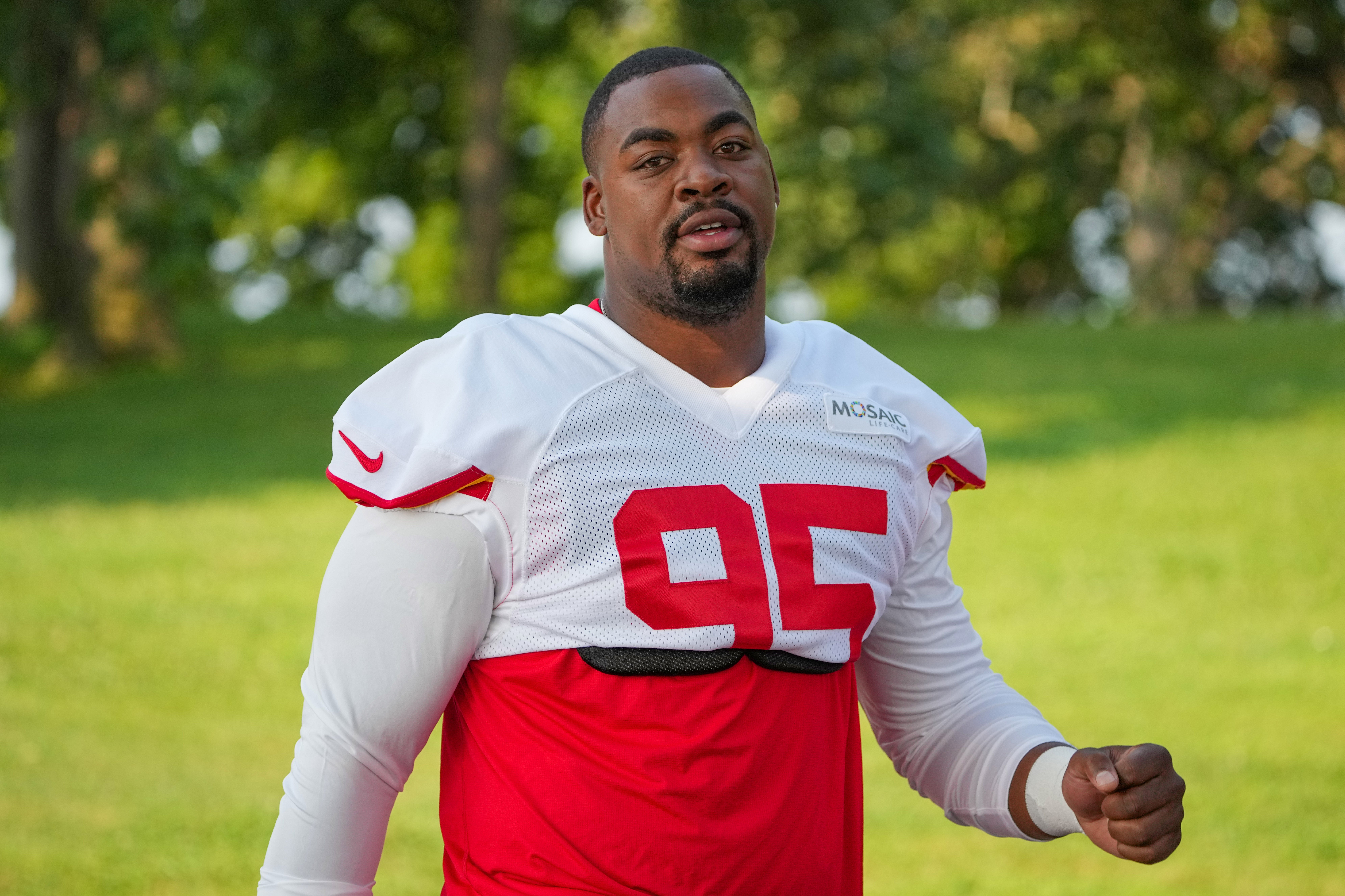 Jul 22, 2024; St. Joseph, MO, USA; Kansas City Chiefs defensive tackle Chris Jones (95) walks down the hill from the locker room to the fields prior to training camp at Missouri Western State University.