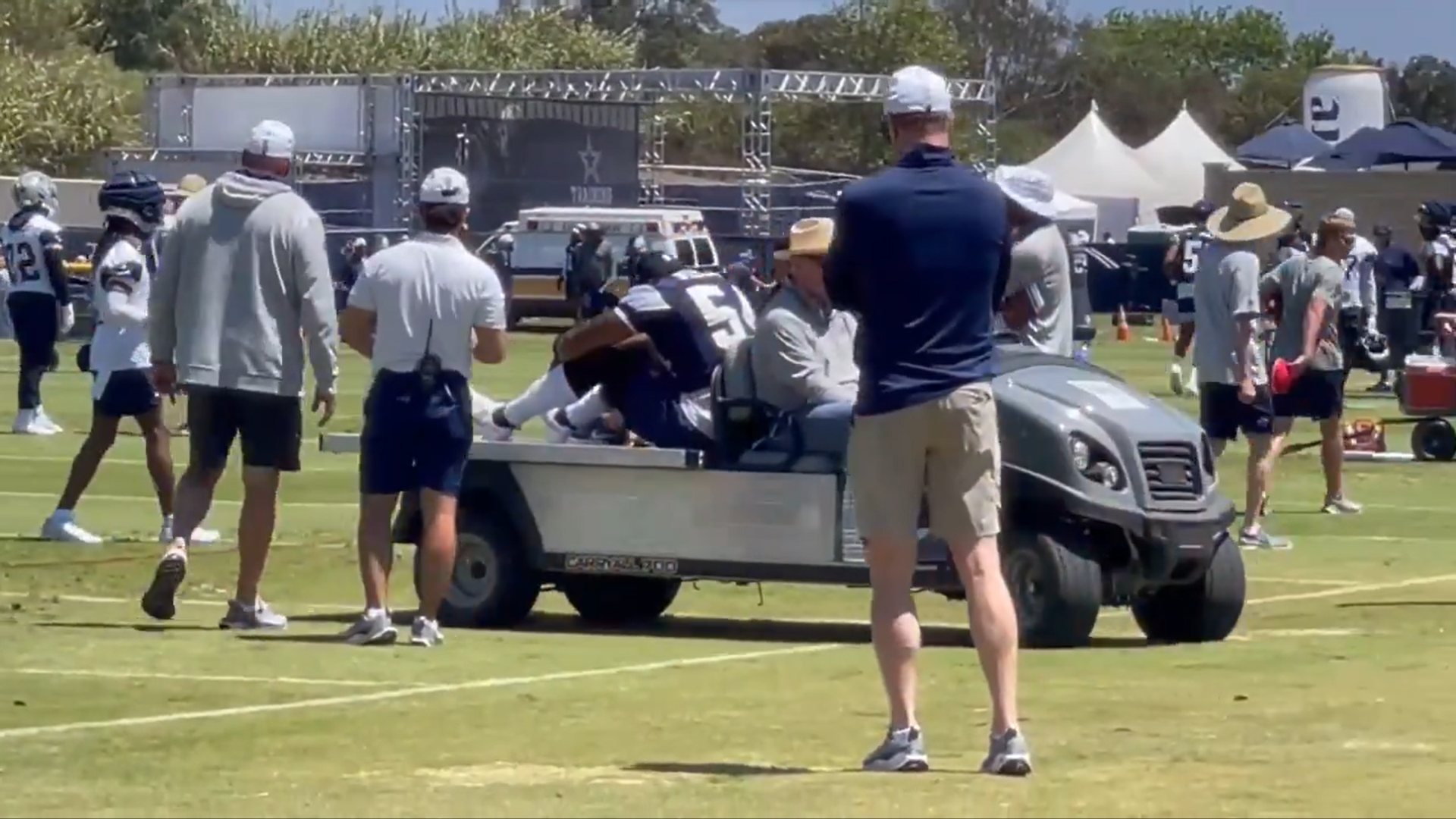 Dallas Cowboys DE Sam Williams carted off the field during 2024 training camp practice.