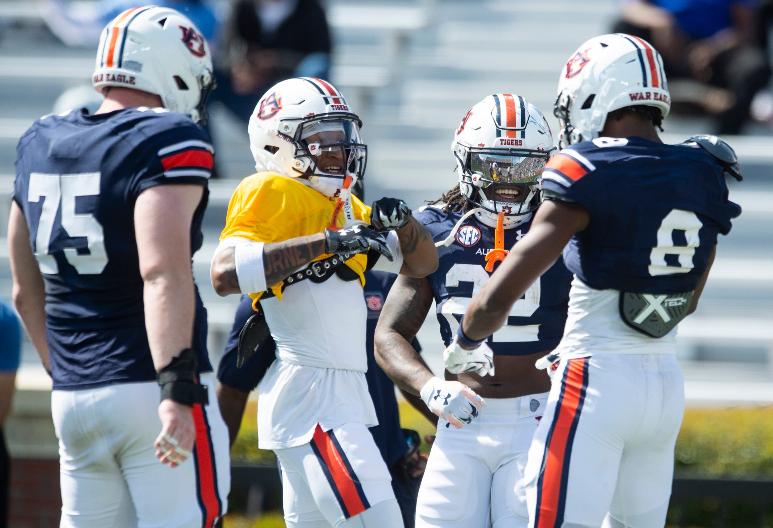 Cam Coleman and company celebrate during spring game.