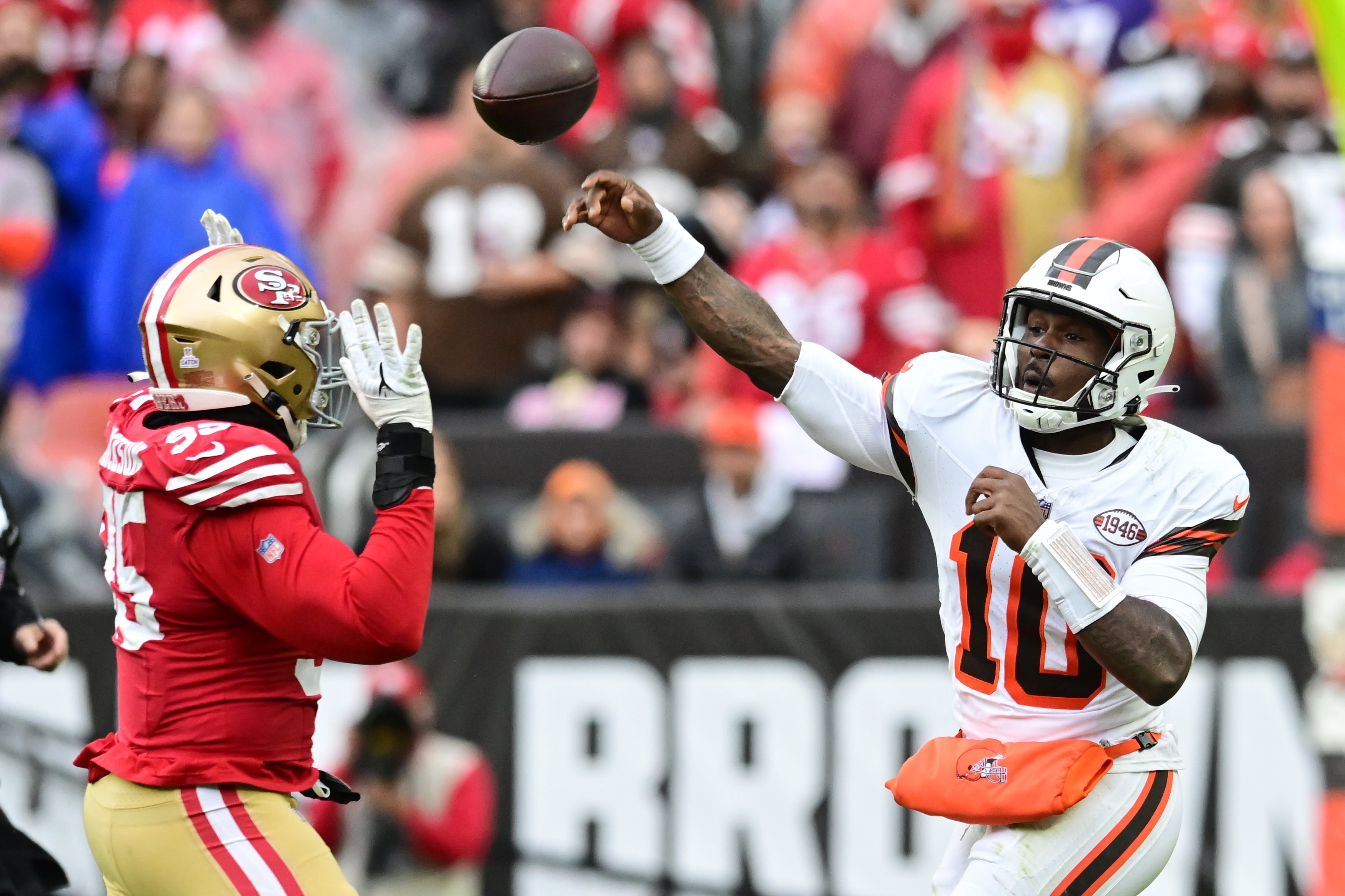 Oct 15, 2023; Cleveland, Ohio, USA; Cleveland Browns quarterback PJ Walker (10) throws a pass over San Francisco 49ers defensive end Drake Jackson (95) during the second half at Cleveland Browns Stadium.