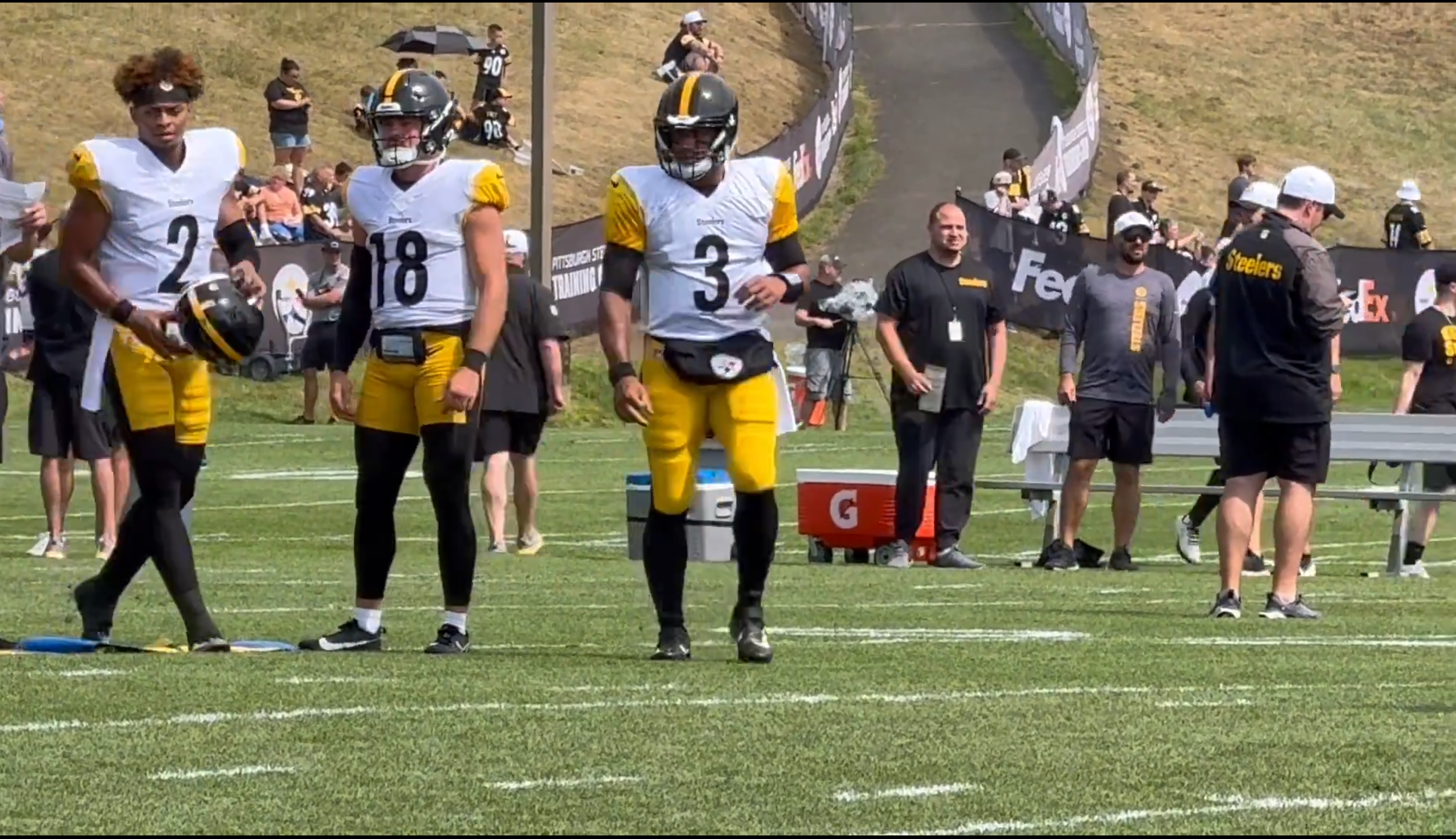 Pittsburgh Steelers QB Russell Wilson & Justin Fields warm up ahead of first padded practice at 2024 training camp in Latrobe, 7/30/24.