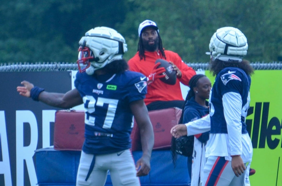 LB Matthew Judon sits to the side during warm ups at Monday's training camp practice - July 29, 2024