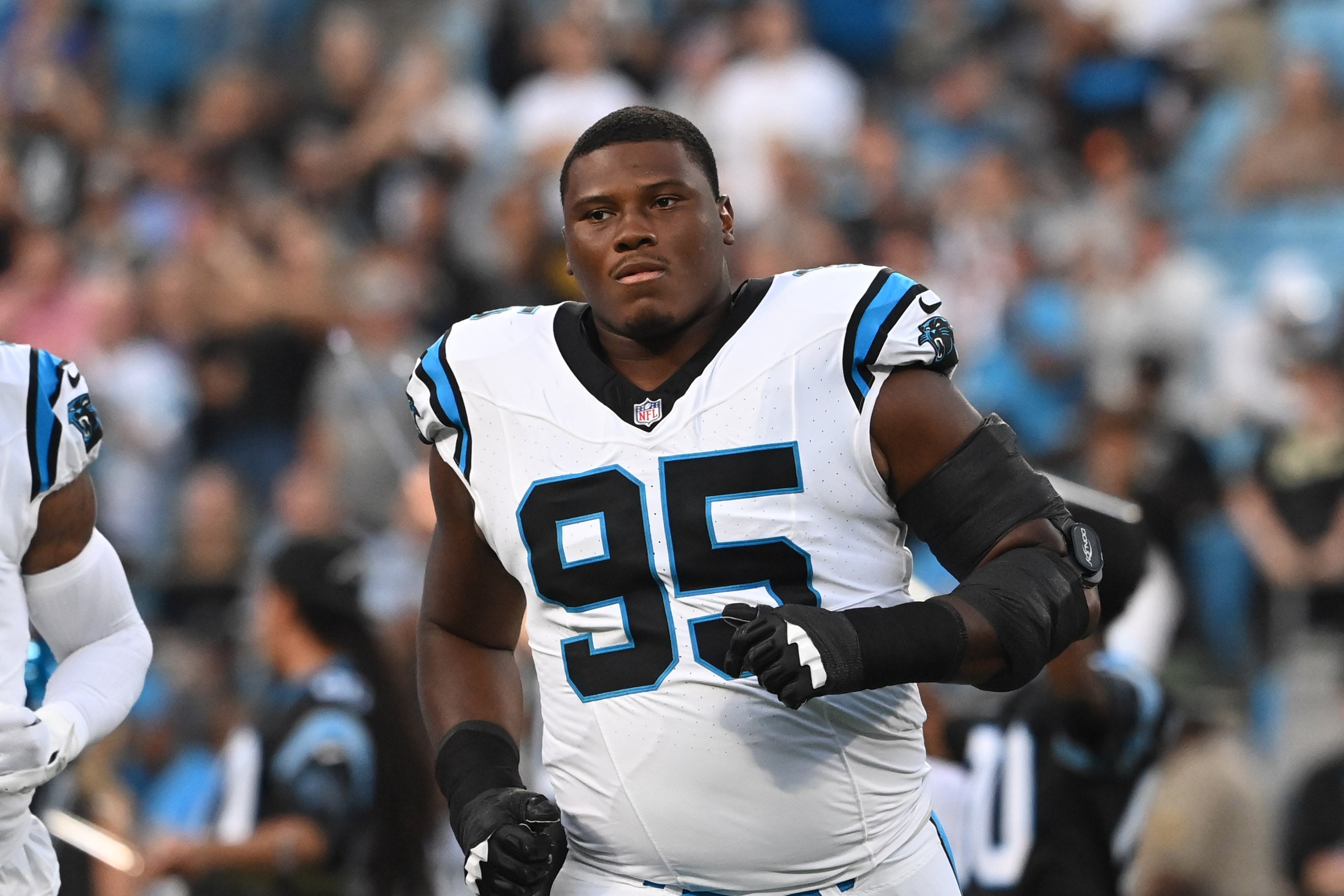 Sep 18, 2023; Charlotte, North Carolina, USA; Carolina Panthers defensive tackle Derrick Brown (95) runs on to the field before the game at Bank of America Stadium. Mandatory Credit: Bob Donnan-USA TODAY Sports