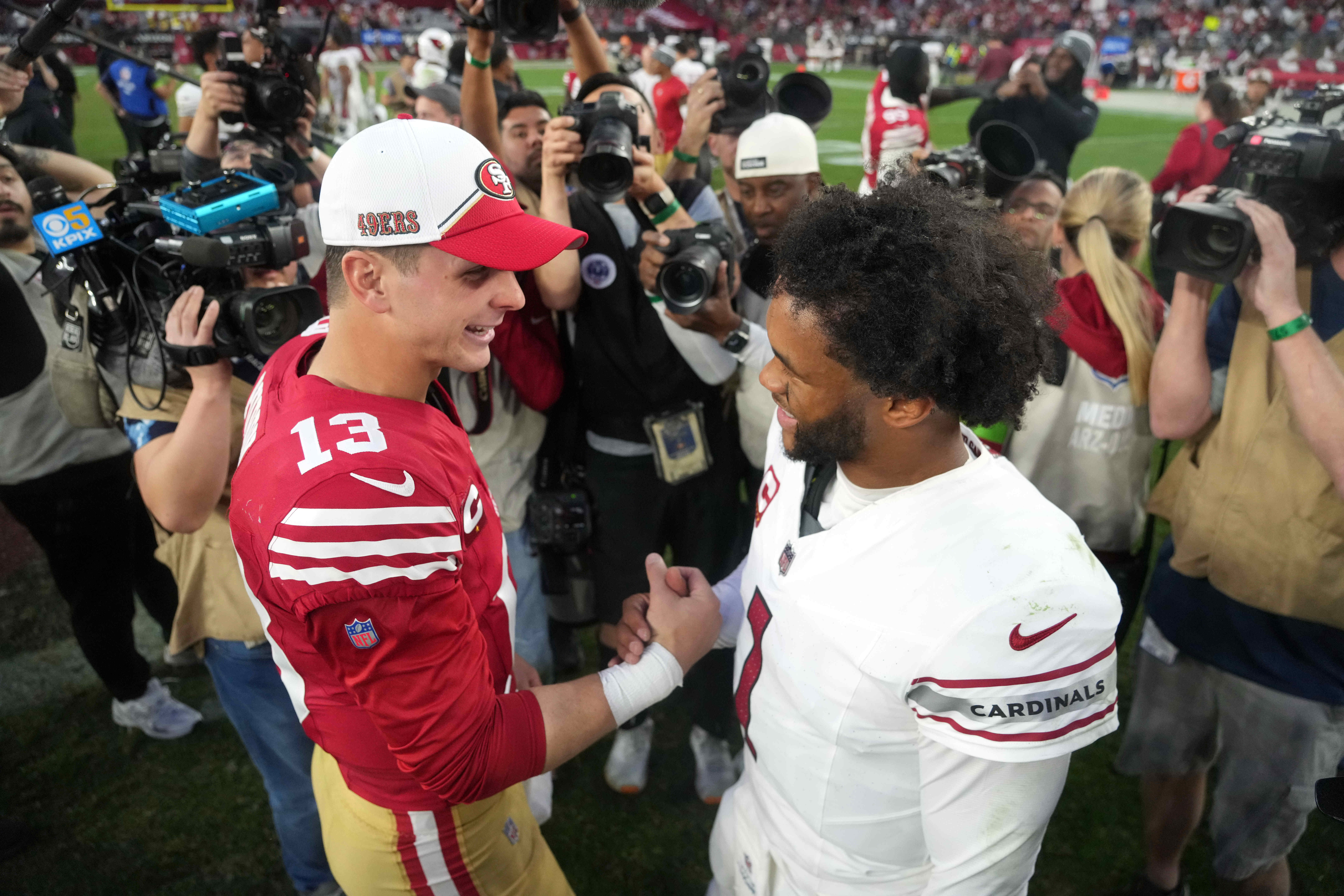 Dec 17, 2023; Glendale, Arizona, USA; San Francisco 49ers quarterback Brock Purdy (13) and Arizona Cardinals quarterback Kyler Murray (1) shake hands after the game at State Farm Stadium.
