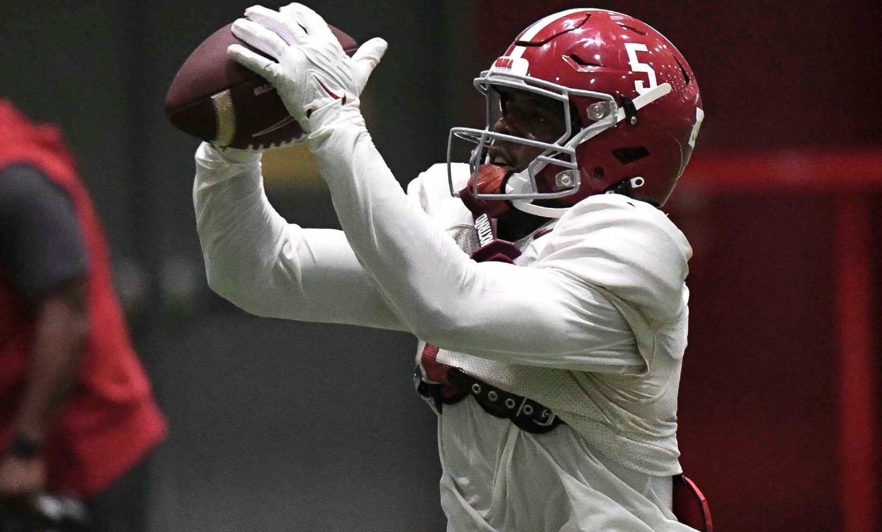 April 9, 2024; Tuscaloosa, Alabama, USA; Alabama wide receiver Germie Bernard (5) catches a pass during practice in the Hank Crisp Indoor Practice Facility at the University of Alabama.