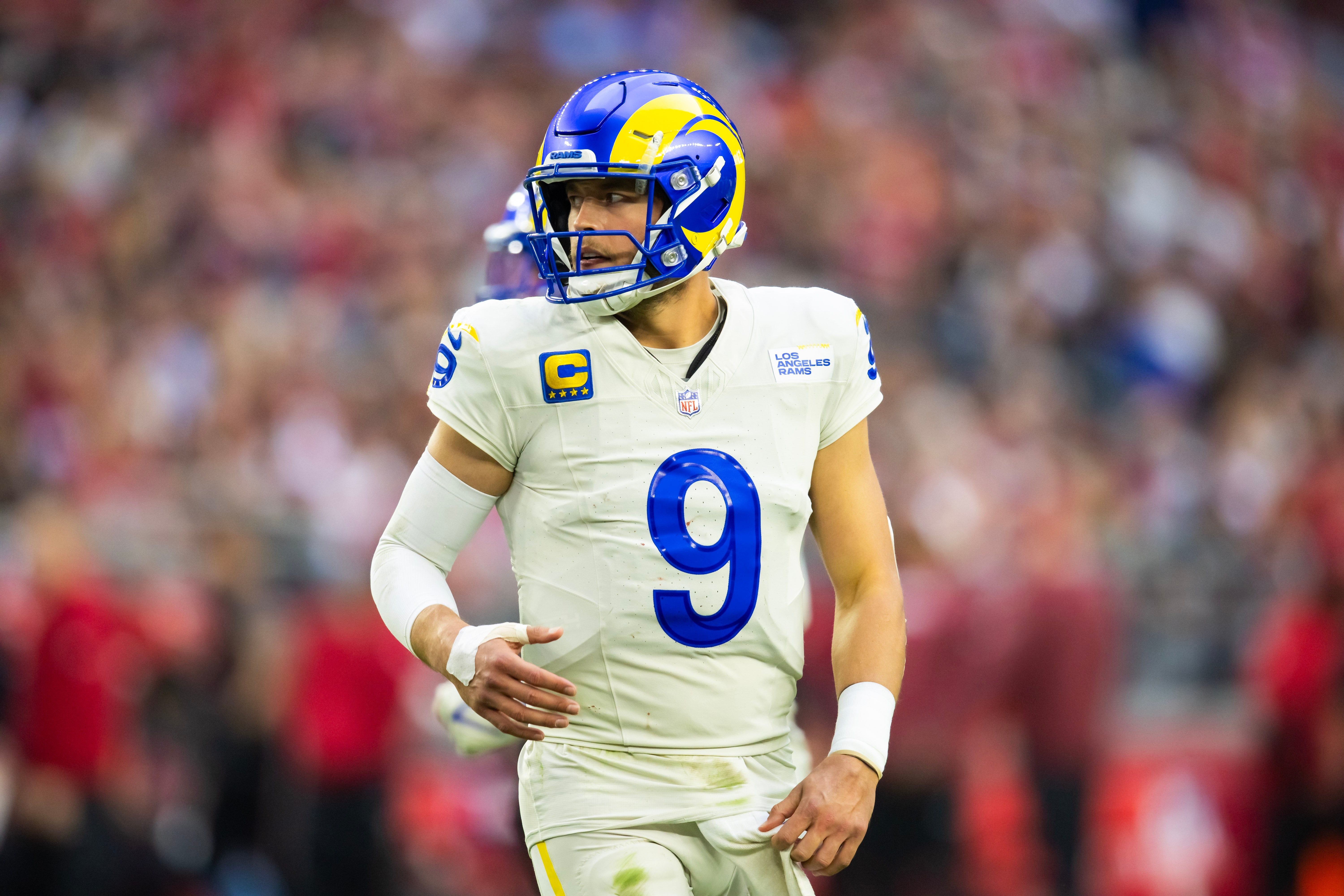 Nov 26, 2023; Glendale, Arizona, USA; Los Angeles Rams quarterback Matthew Stafford (9) against the Arizona Cardinals at State Farm Stadium. Mandatory Credit: Mark J. Rebilas-USA TODAY Sports