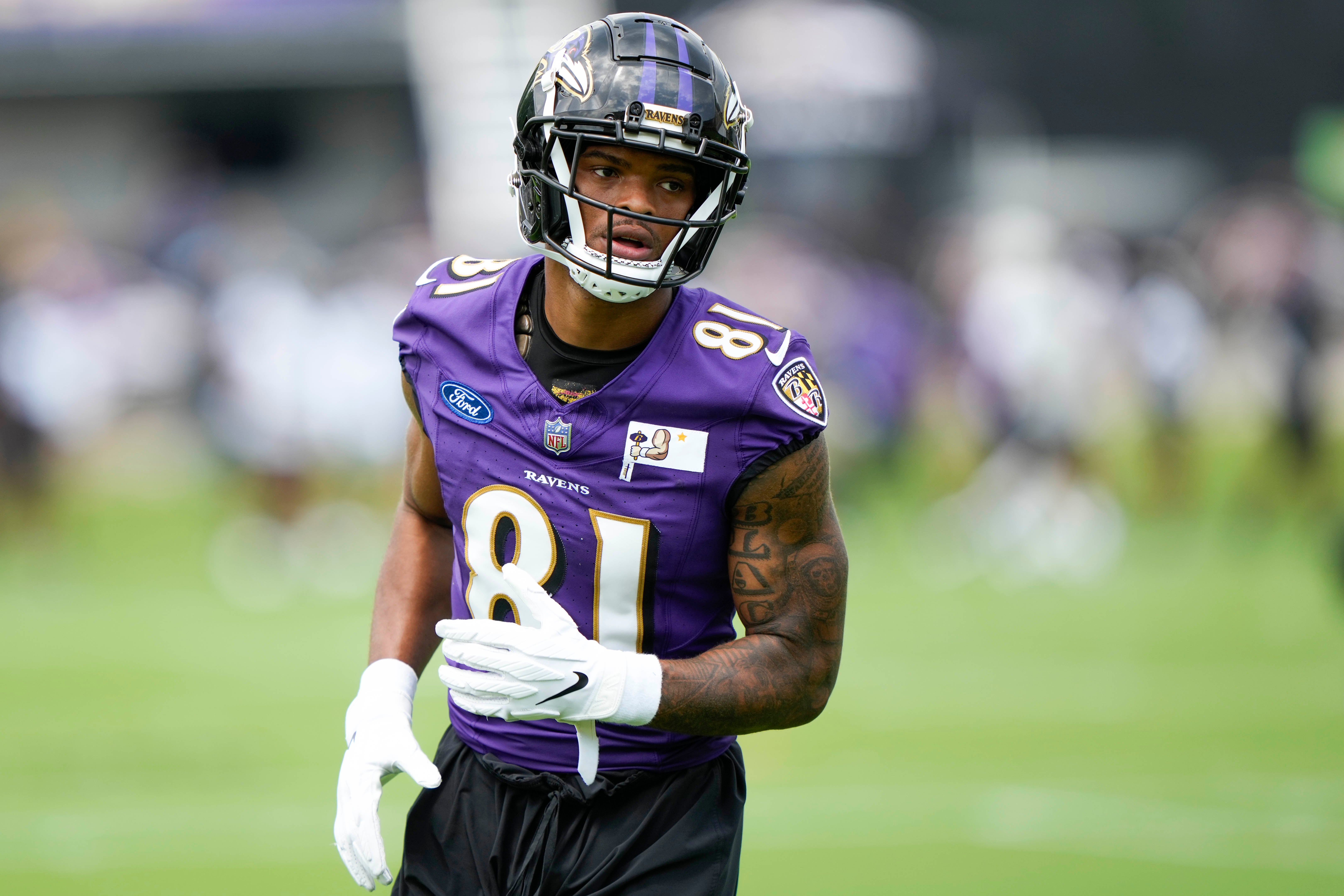 Jul 27, 2023; Owings Mills, MD, USA; Baltimore Ravens wide receiver Tarik Black (81) reacts after catching a pass during training camp practice at Under Armour Performance Center. Mandatory Credit: Brent Skeen-USA TODAY Sports  