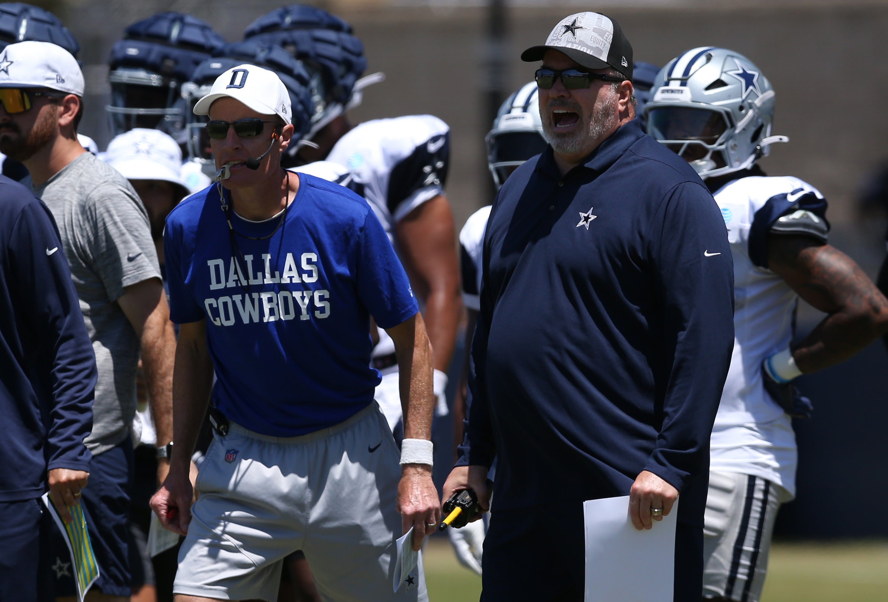 Dallas Cowboys special teams coordinator John Fassel and head coach Mike McCarthy during training camp at the River Ridge Playing Fields in Oxnard, California.