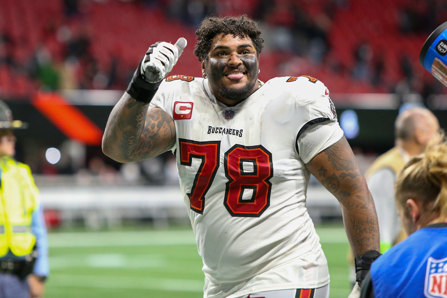 Dec 10, 2023; Atlanta, Georgia, USA; Tampa Bay Buccaneers offensive tackle Tristan Wirfs (78) celebrates after a victory against the Atlanta Falcons at Mercedes-Benz Stadium.