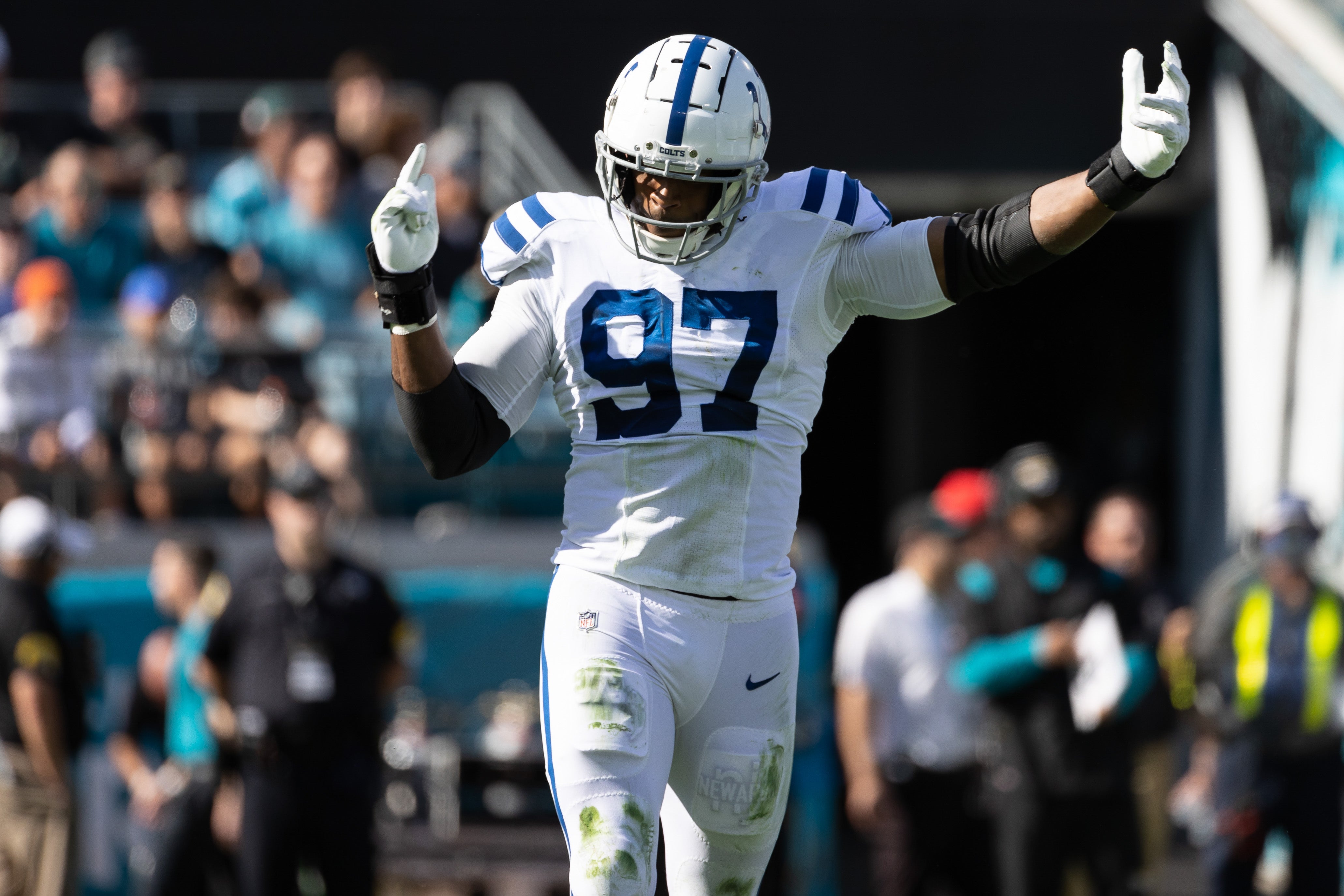 Indianapolis Colts defensive end Al-Quadin Muhammad (97) celebrates after a sack during the first half against the Jacksonville Jaguars at TIAA Bank Field.