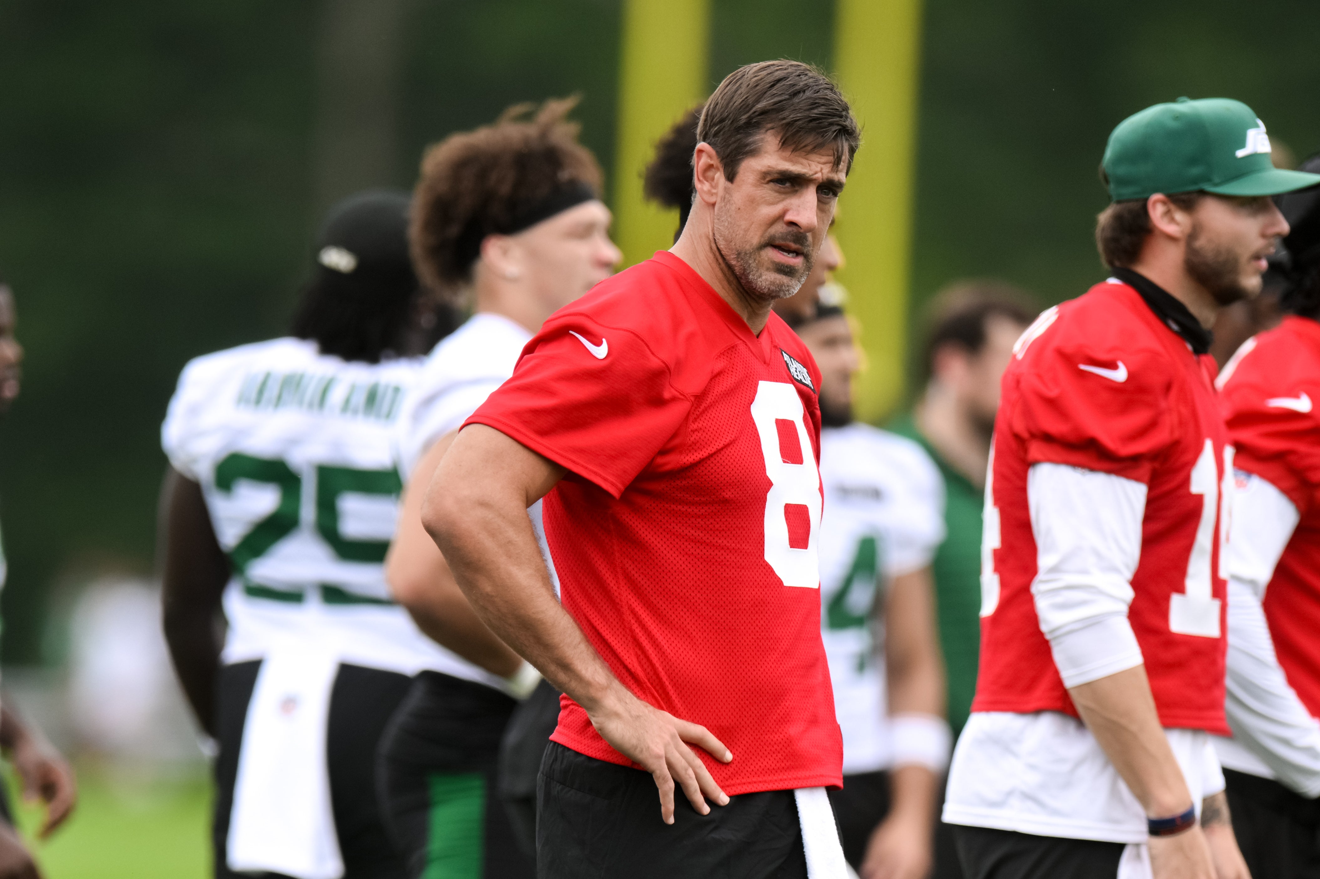 New York Jets quarterback Aaron Rodgers (8) looks on during training camp at Atlantic Health Jets Training Center.