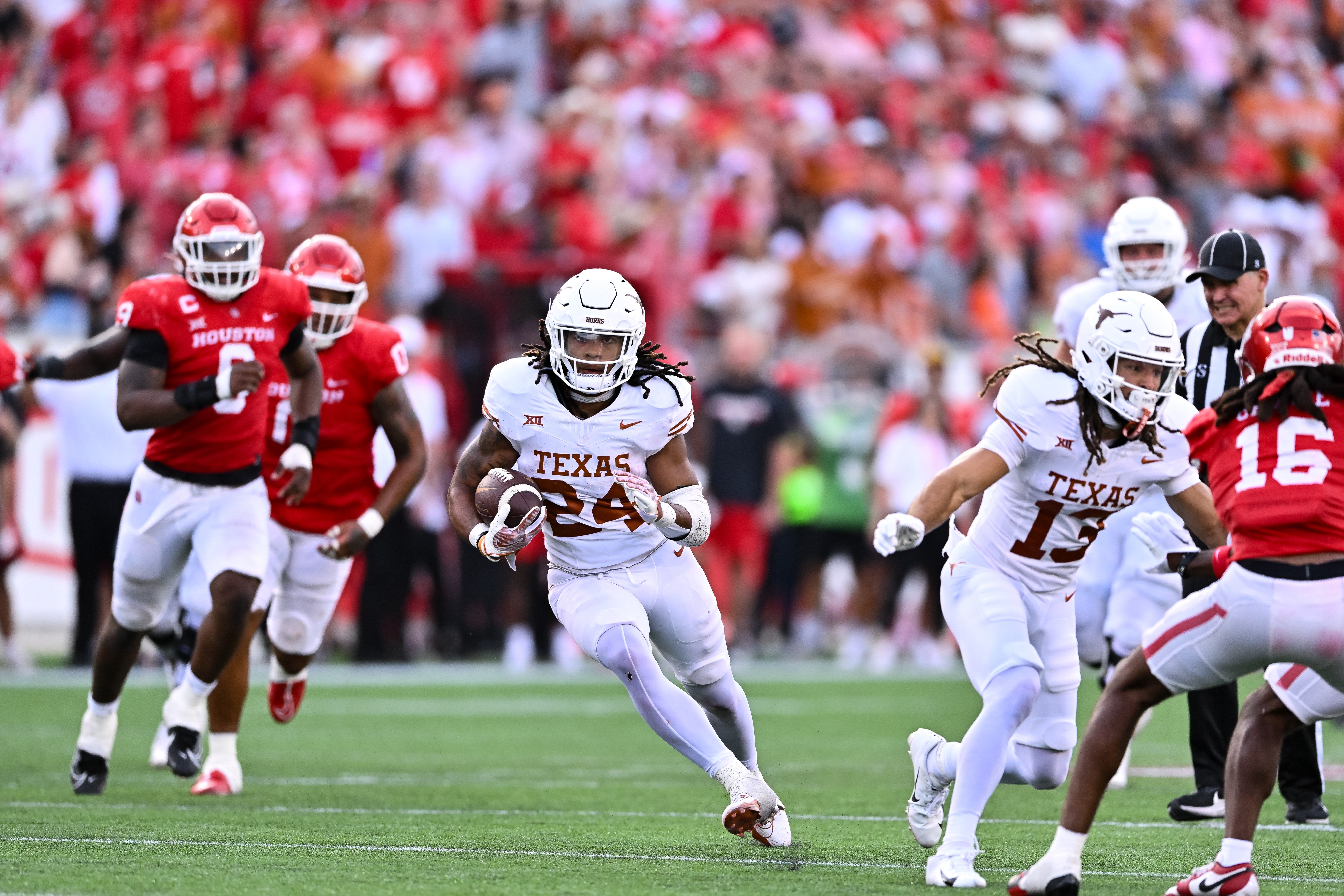 Oct 21, 2023; Houston, Texas, USA; Texas Longhorns running back Jonathon Brooks (24) runs the ball during the third quarter against the Houston Cougars at TDECU Stadium. Mandatory Credit: Maria Lysaker-USA TODAY Sports