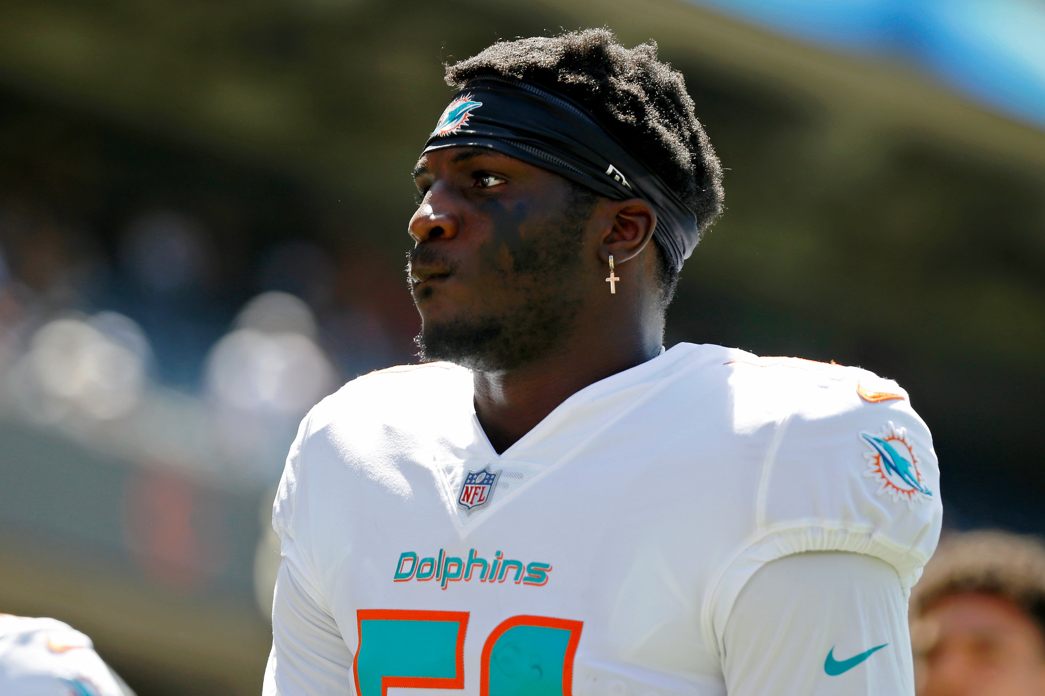Aug 14, 2021; Chicago, Illinois, USA; Miami Dolphins defensive back Trill Williams (51) walks back to the locker room after warmups before the game against the Chicago Bears at Soldier Field.