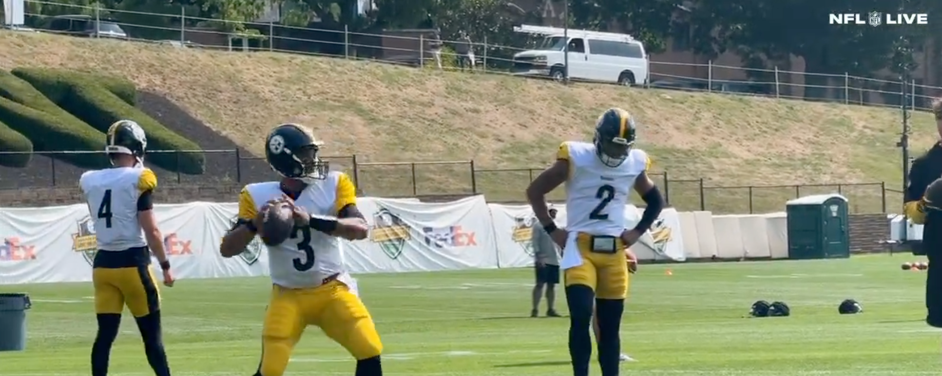 Russell Wilson and Justin Fields warm up ahead of practice at Pittsburgh Steelers training camp.