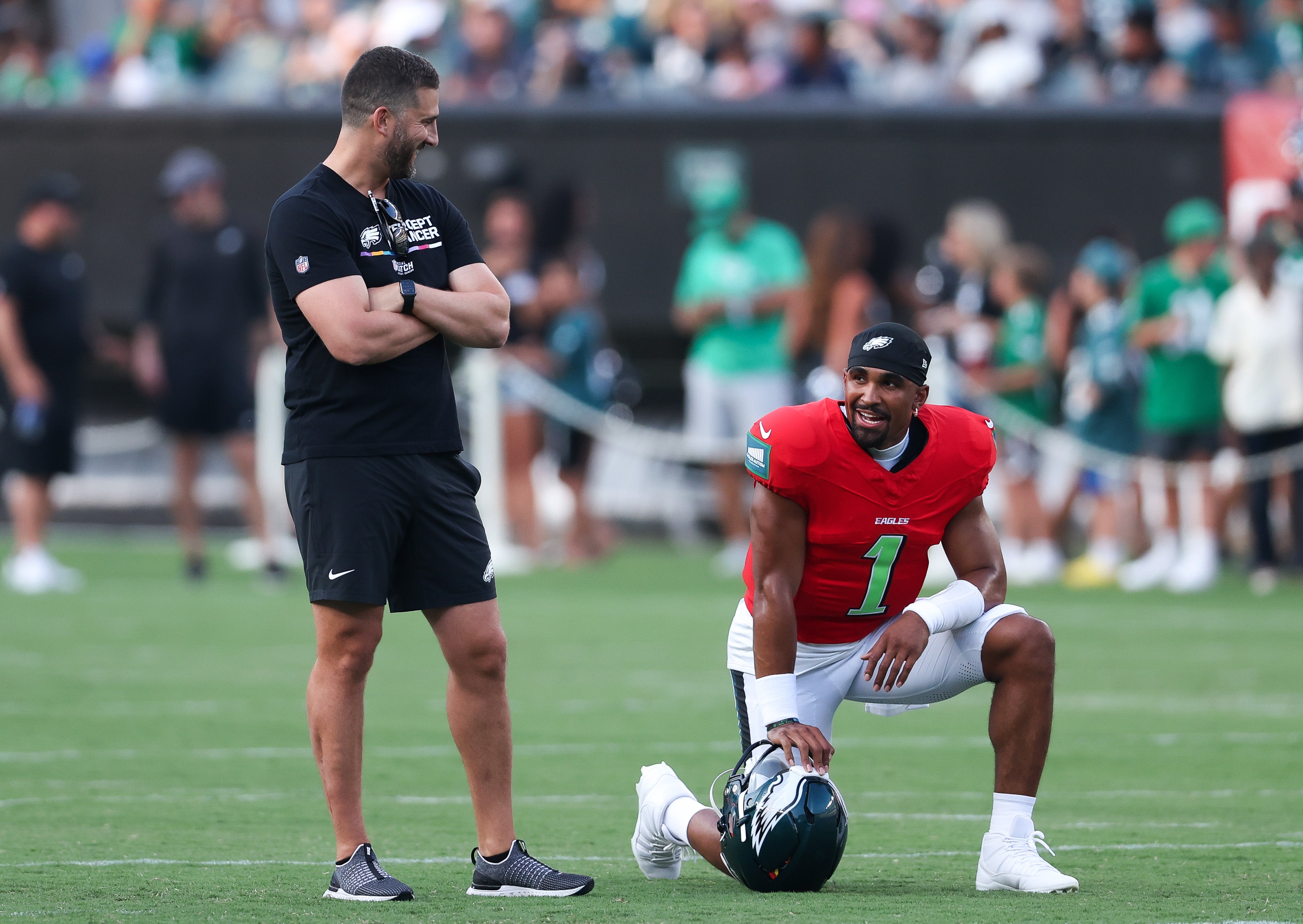 Philadelphia Eagles quarterback Jalen Hurts (1) talks with head coach Nick Sirianni (L) during a practice at Lincoln Financial Field.