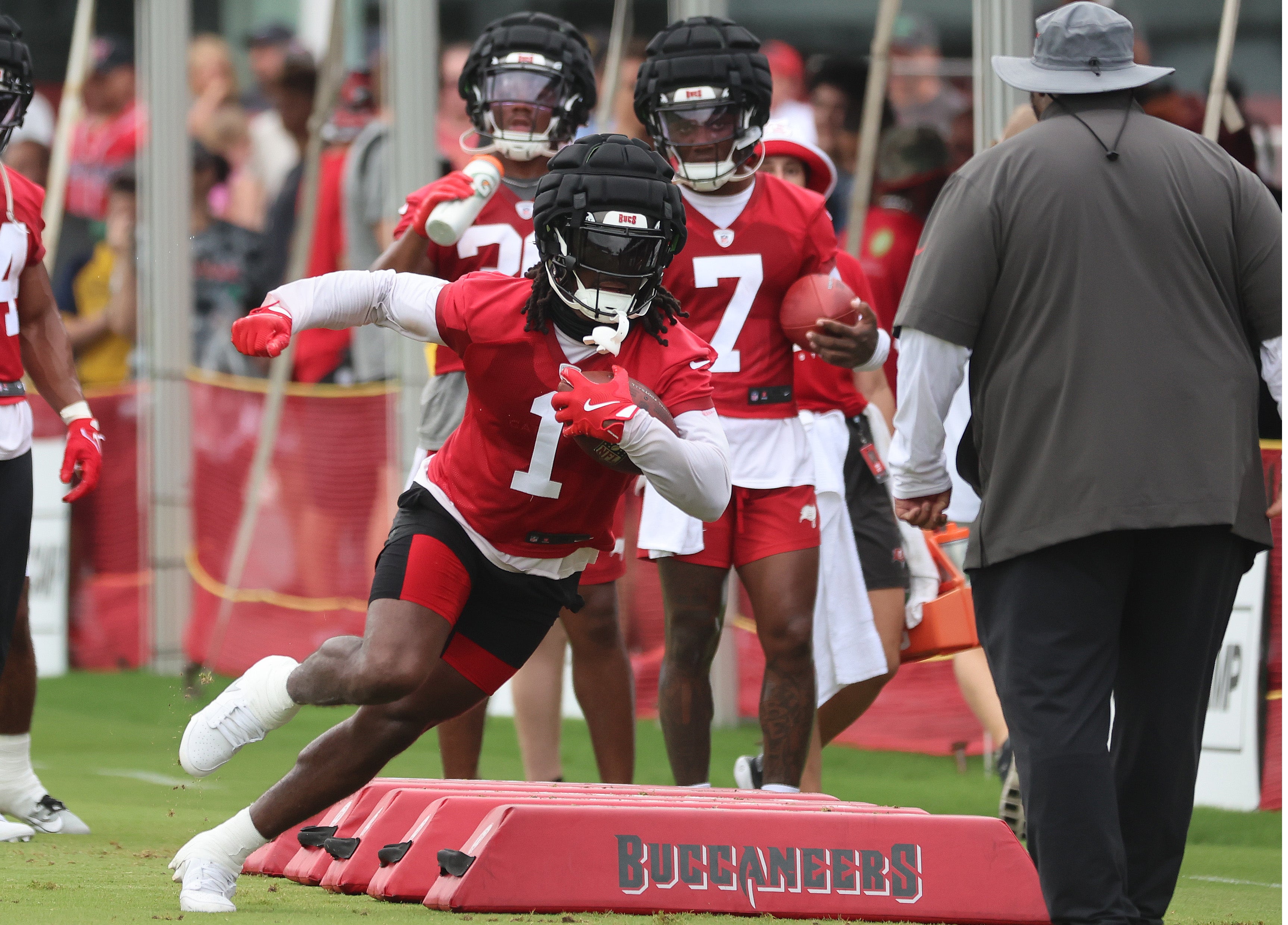Jul 25, 2024; Tampa, FL, USA; Tampa Bay Buccaneers running back Rachaad White (1), running back Bucky Irving (7) during training camp at AdventHealth Training Center.
