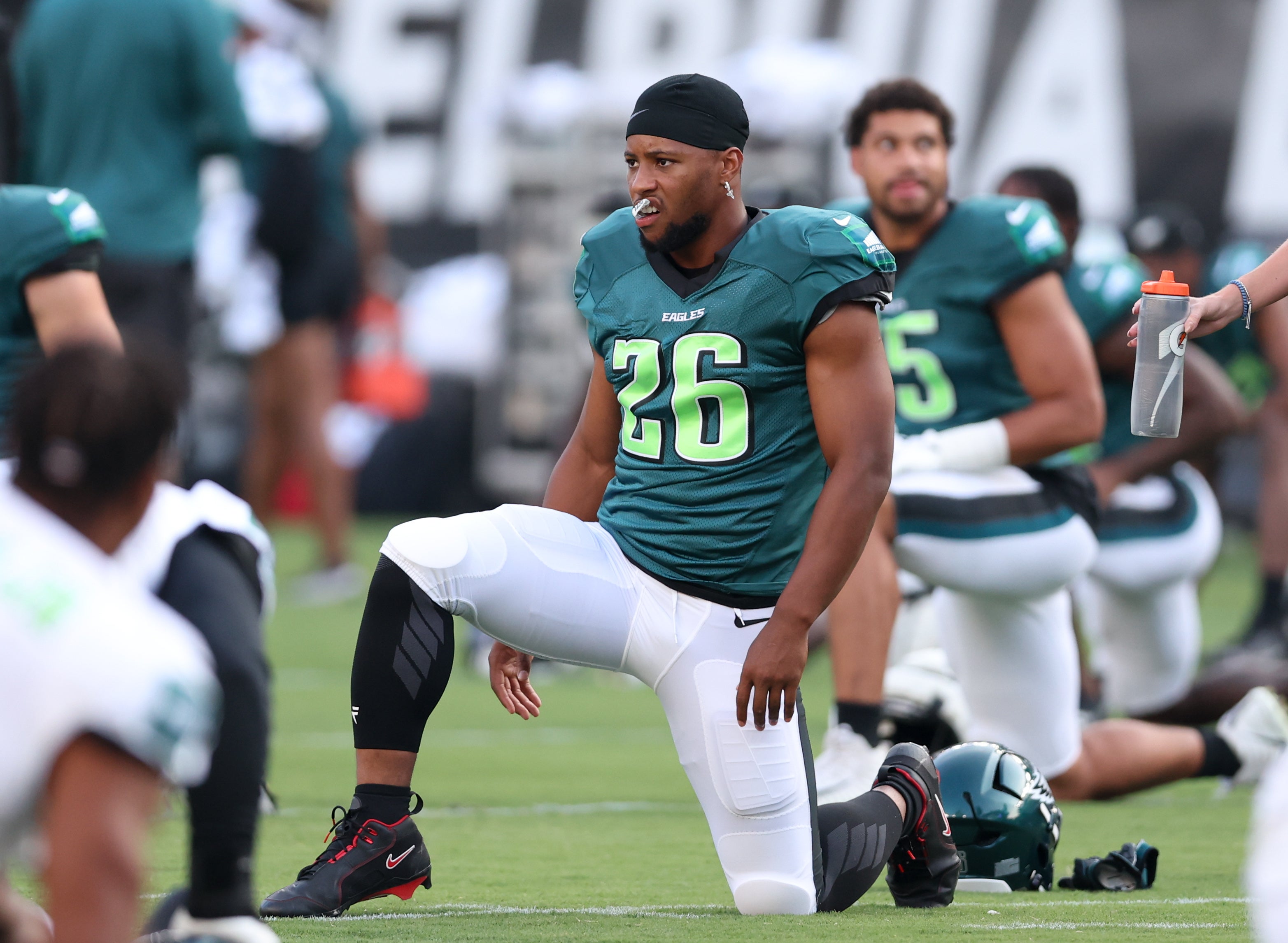 Philadelphia Eagles running back Saquon Barkley (26) stretches during practice at Lincoln Financial Field.