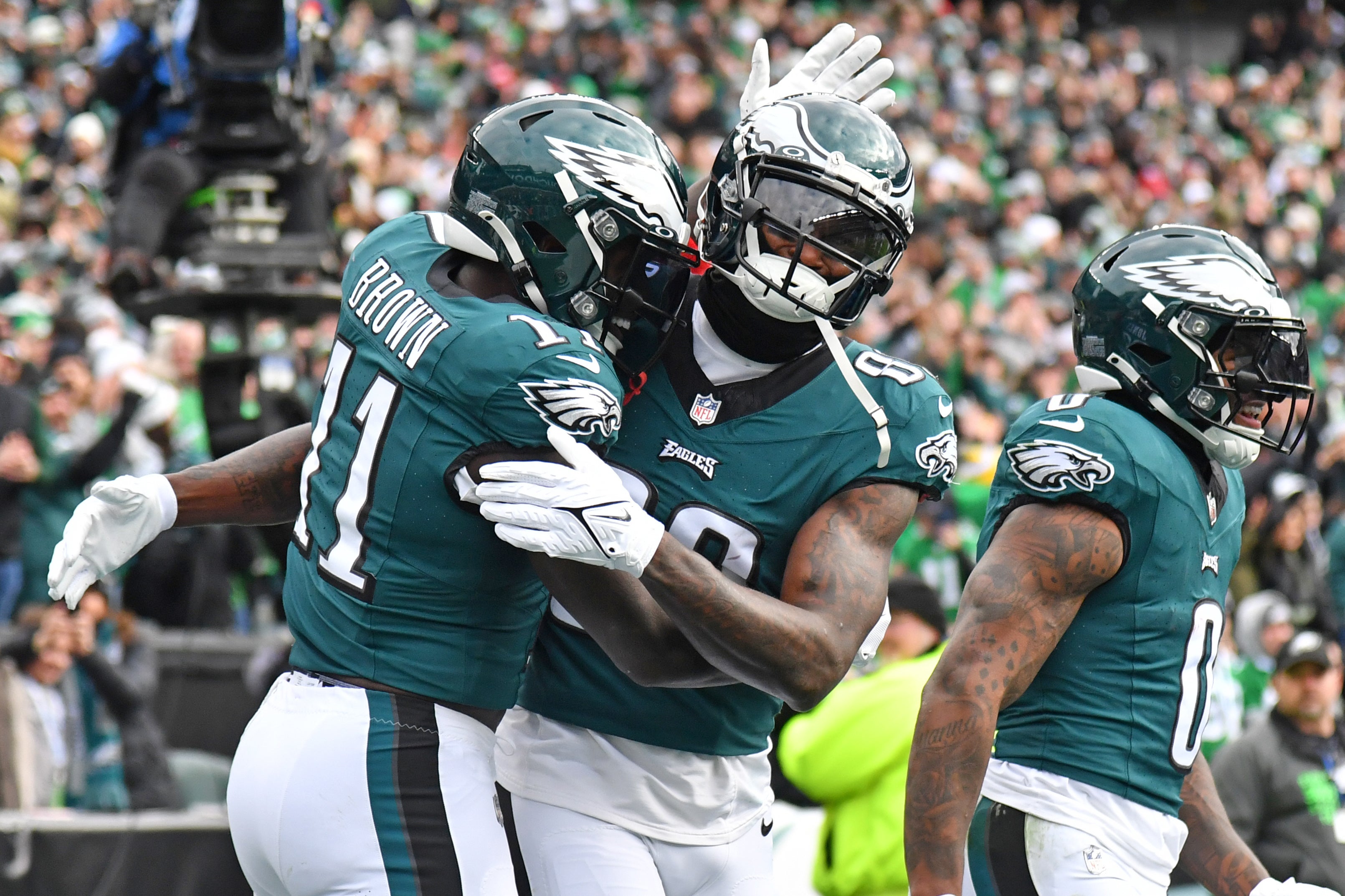 Philadelphia Eagles wide receiver Julio Jones (80) celebrates his 12-yard touchdown with wide receiver A.J. Brown (11) against the Arizona Cardinals during the first quarter at Lincoln Financial Field.