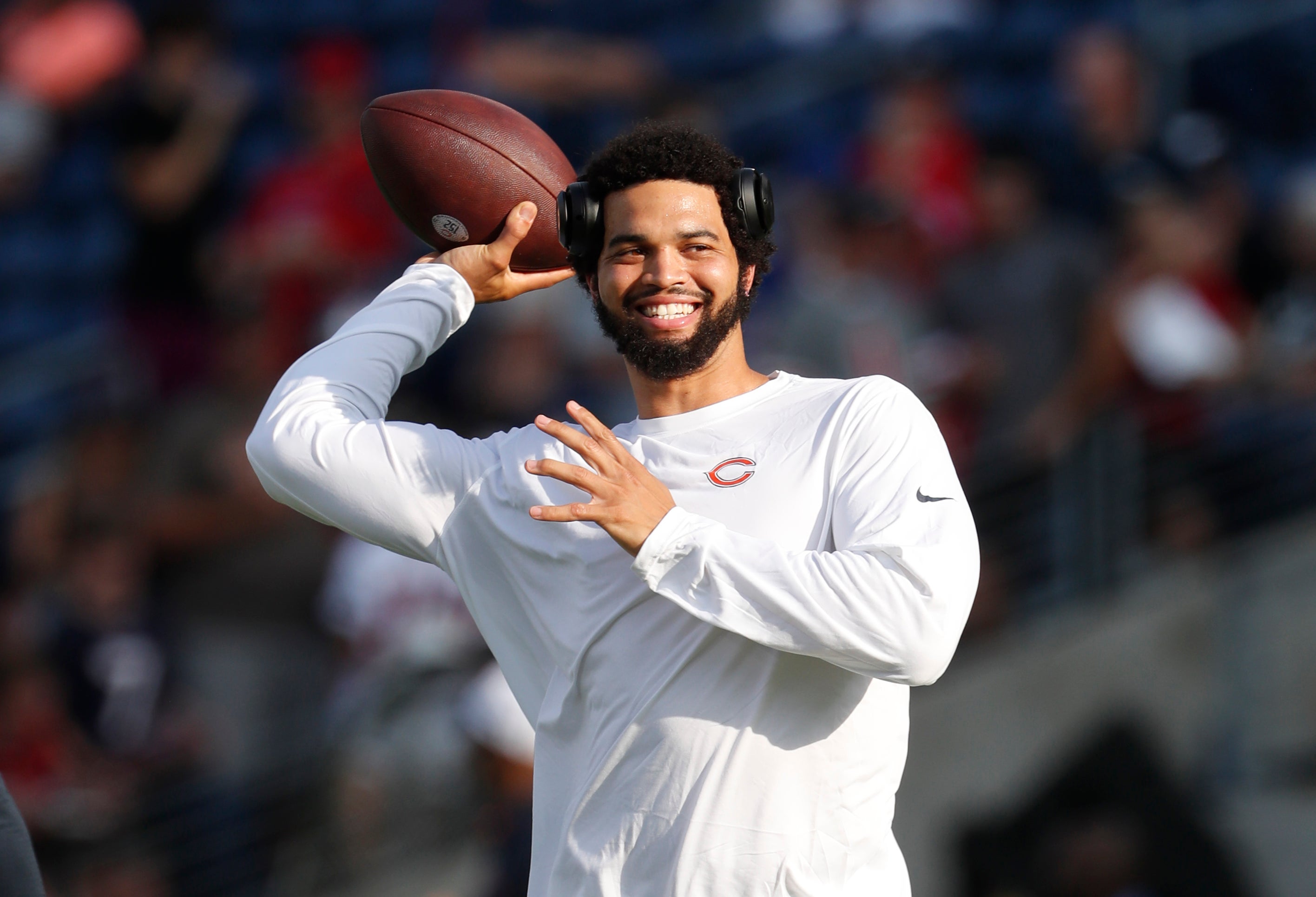 Aug 1, 2024; Canton, Ohio, USA; Chicago Bears quarterback Caleb Williams (18) warms up before the game against the Houston Texans at Tom Benson Hall of Fame Stadium.