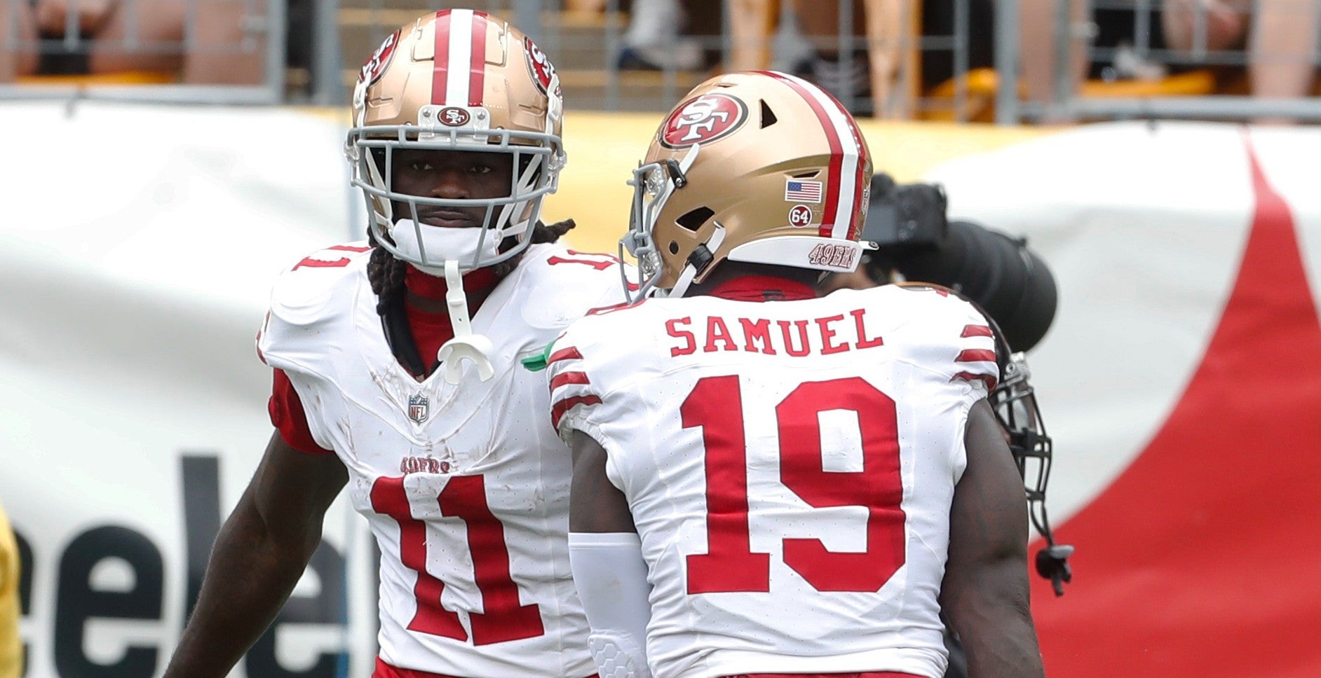 Sep 10, 2023; Pittsburgh, Pennsylvania, USA; San Francisco 49ers wide receiver Brandon Aiyuk (11) celebrates his second touchdown catch with wide receiver Deebo Samuel (19) against the Pittsburgh Steelers during the second quarter at Acrisure Stadium. Mandatory Credit: Charles LeClaire-USA TODAY Sports