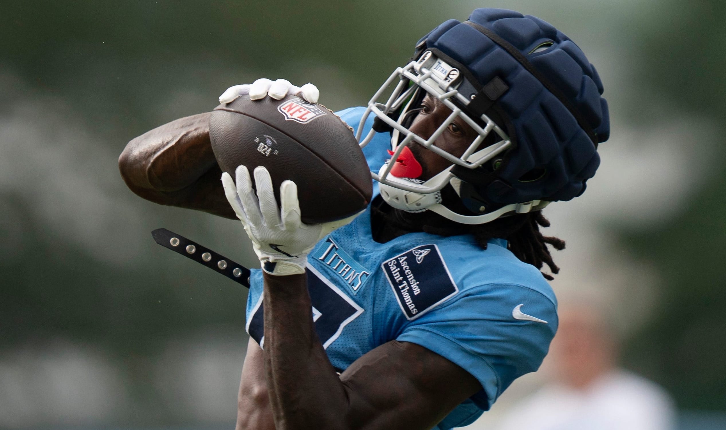 Tennessee Titans wide receiver Calvin Ridley (0) makes a long catch during training camp at Ascension Saint Thomas Sports Park Wednesday, Aug. 7, 2024 Denny Simmons / The Tennessean-USA TODAY NETWORK