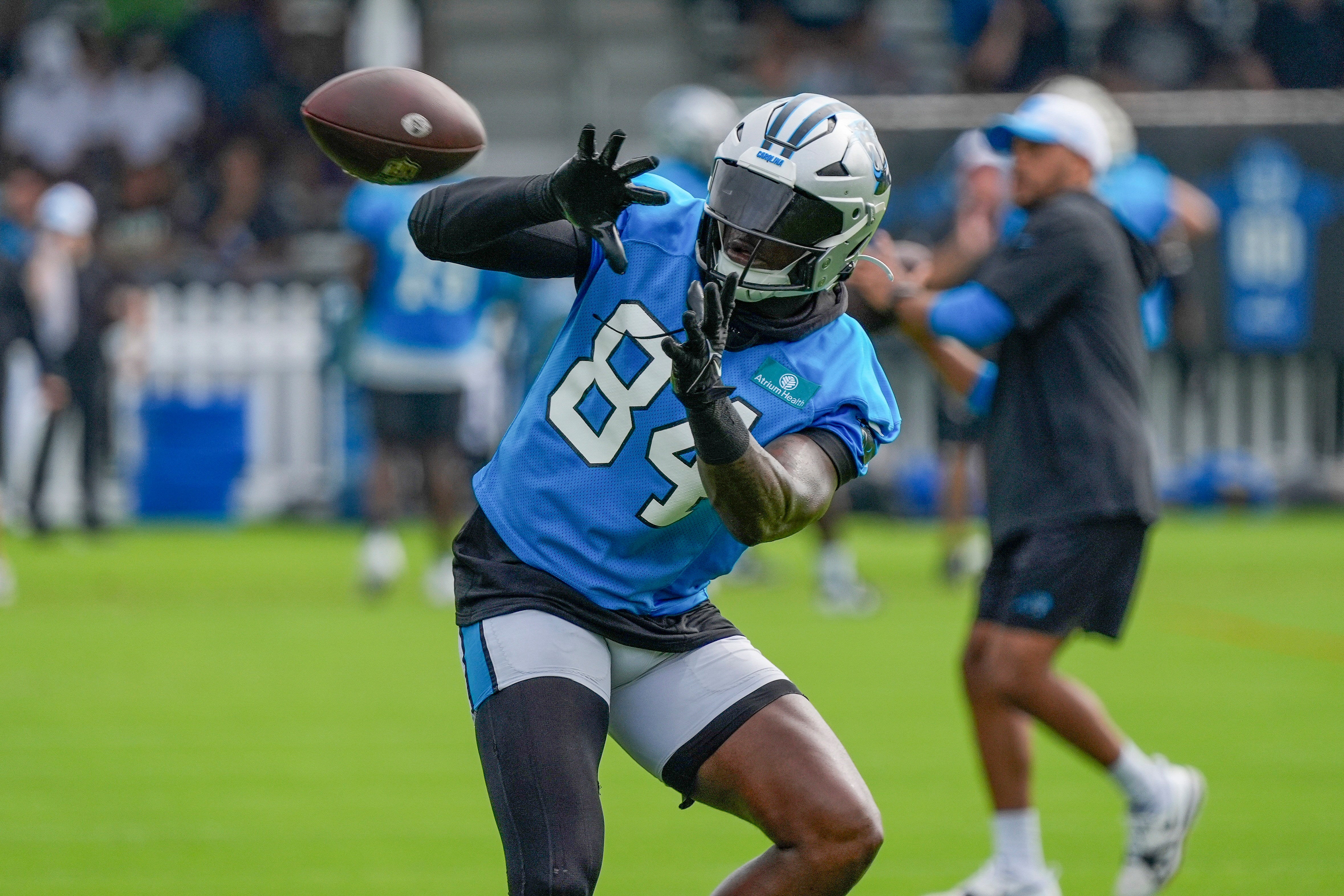 Jul 24, 2024; Charlotte, NC, USA; Carolina Panthers tight end Stephen Sullivan (84) makes a catch at Carolina Panthers Practice Fields. Mandatory Credit: Jim Dedmon-USA TODAY Sports