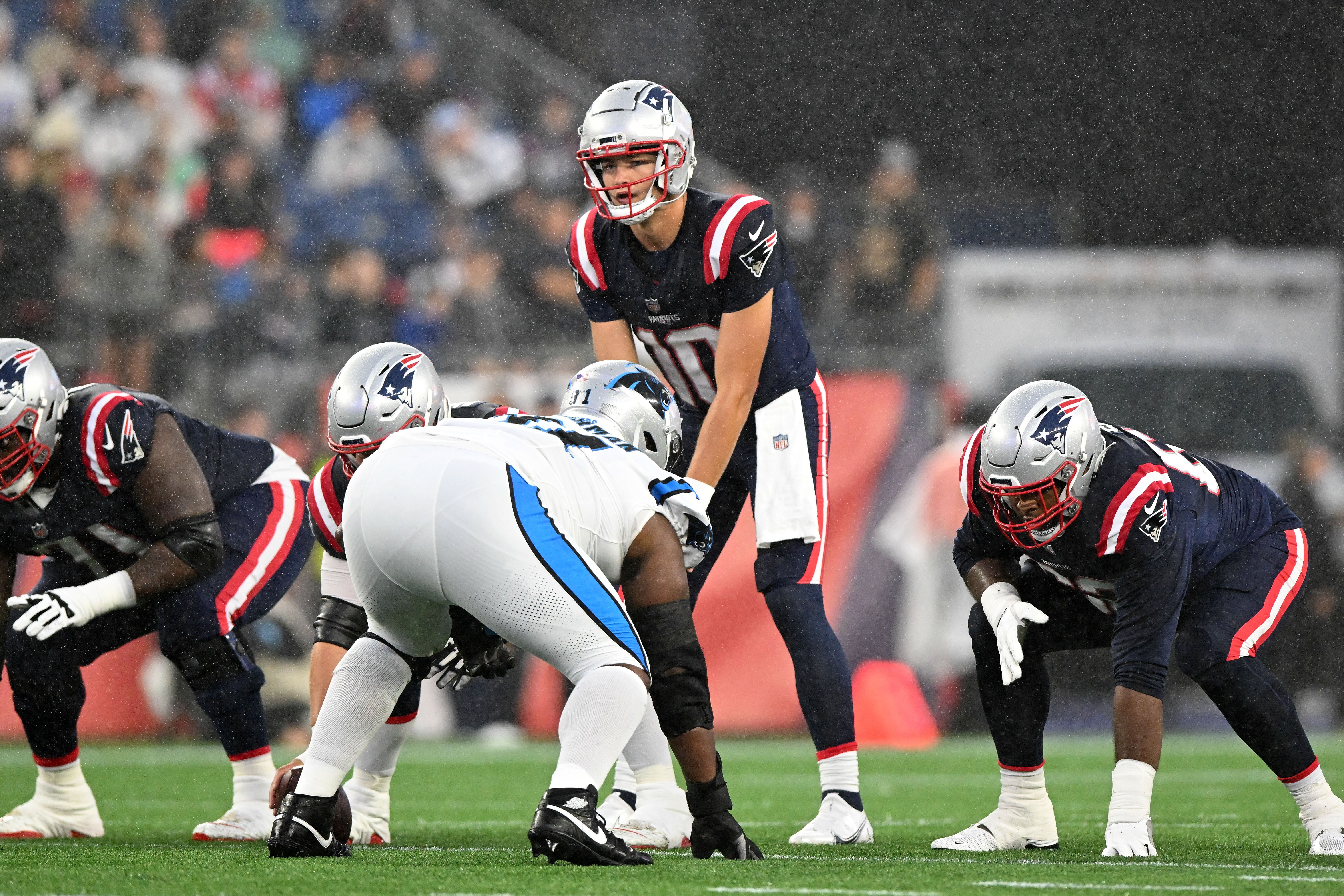 Aug 8, 2024; Foxborough, Massachusetts, USA; New England Patriots quarterback Drake Maye (10) lines up against the Carolina Panthers during the first half at Gillette Stadium.