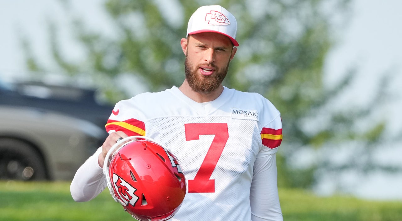 Jul 22, 2024; St. Joseph, MO, USA; Kansas City Chiefs kicker Harrison Butker (7) walks down the hill from the locker room to the fields prior to training camp at Missouri Western State University.