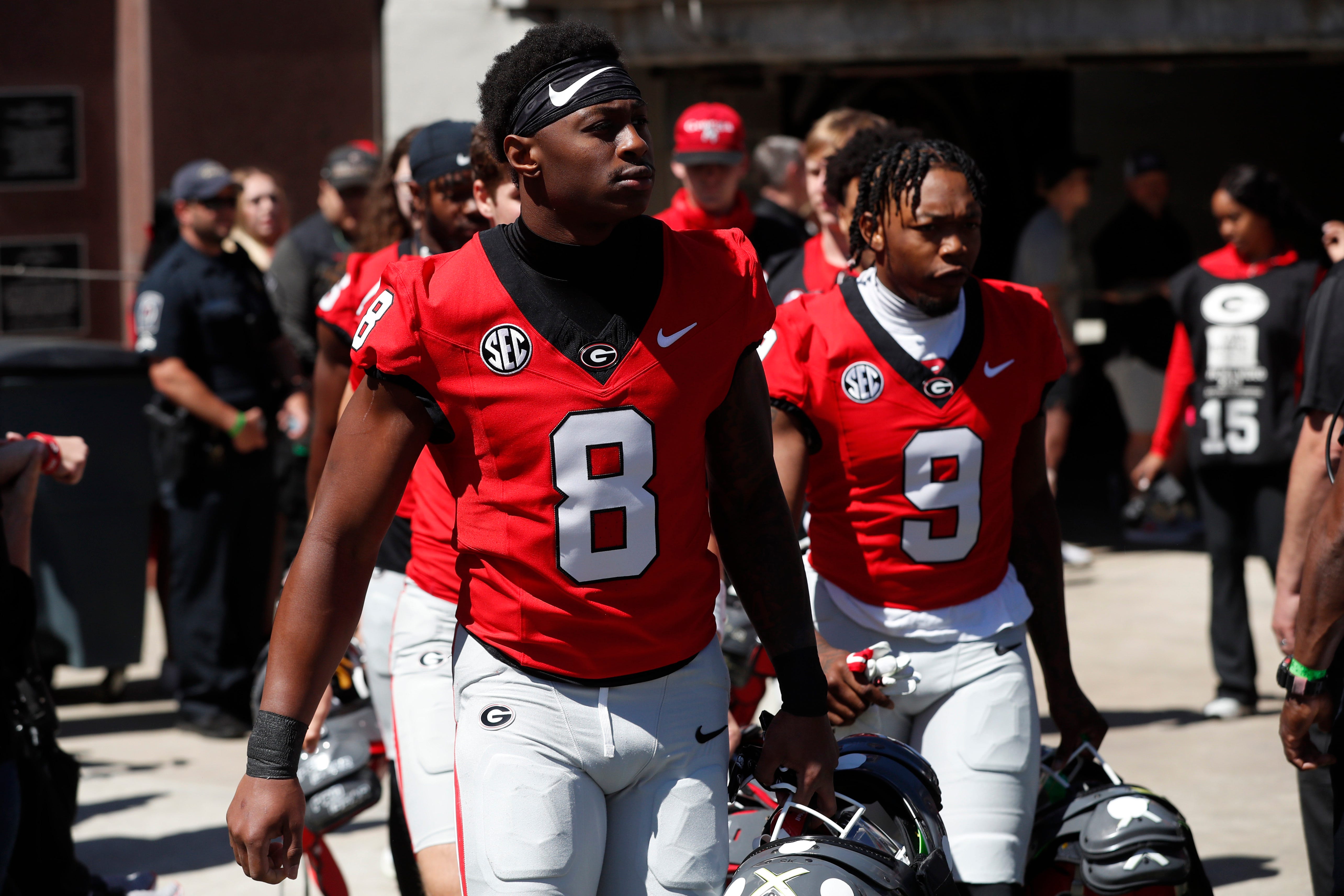 Georgia wide receiver Colbie Young (8) arrives with the team before the start of the G-Day spring football game in Athens, Ga., on Saturday, April 13, 2024.