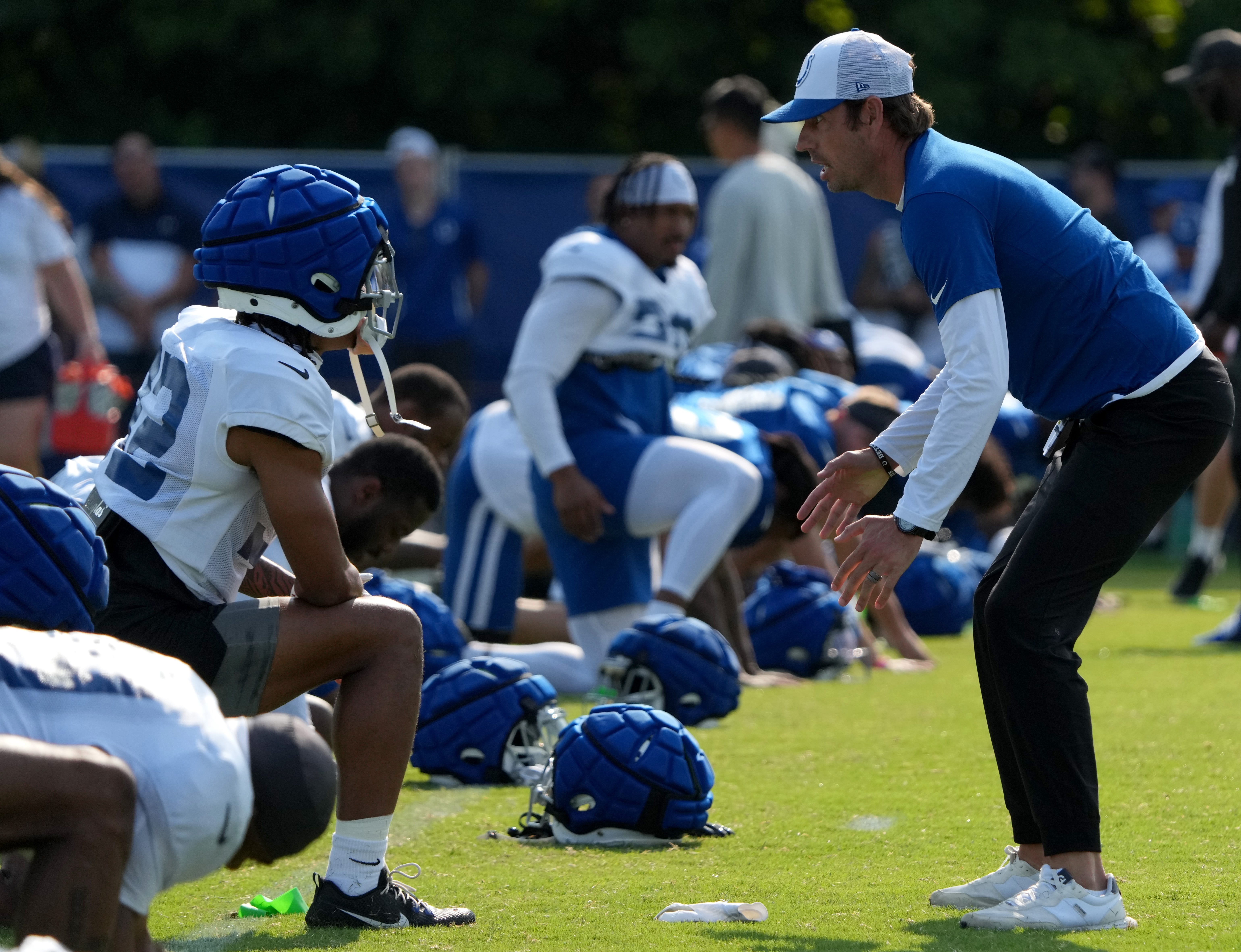 Indianapolis Colts head coach Shane Steichen (right) speaks with Indianapolis Colts safety Julian Blackmon (32) during the Colts’ training camp Wednesday, July 31, 2024, at Grand Park Sports Complex in Westfield.