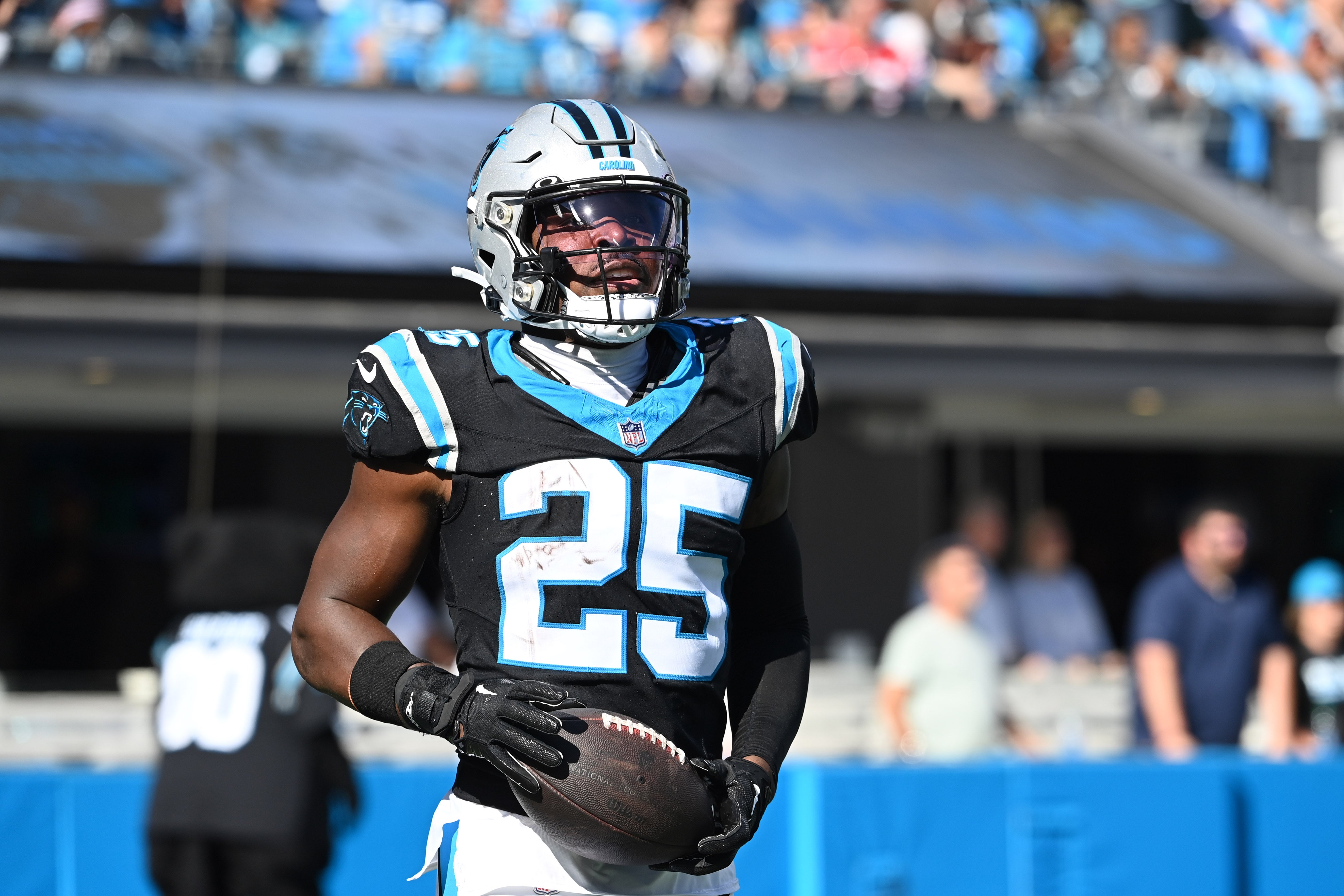 Oct 29, 2023; Charlotte, North Carolina, USA; Carolina Panthers safety Xavier Woods (25) after recovering the ball in the third quarter at Bank of America Stadium. Mandatory Credit: Bob Donnan-USA TODAY Sports