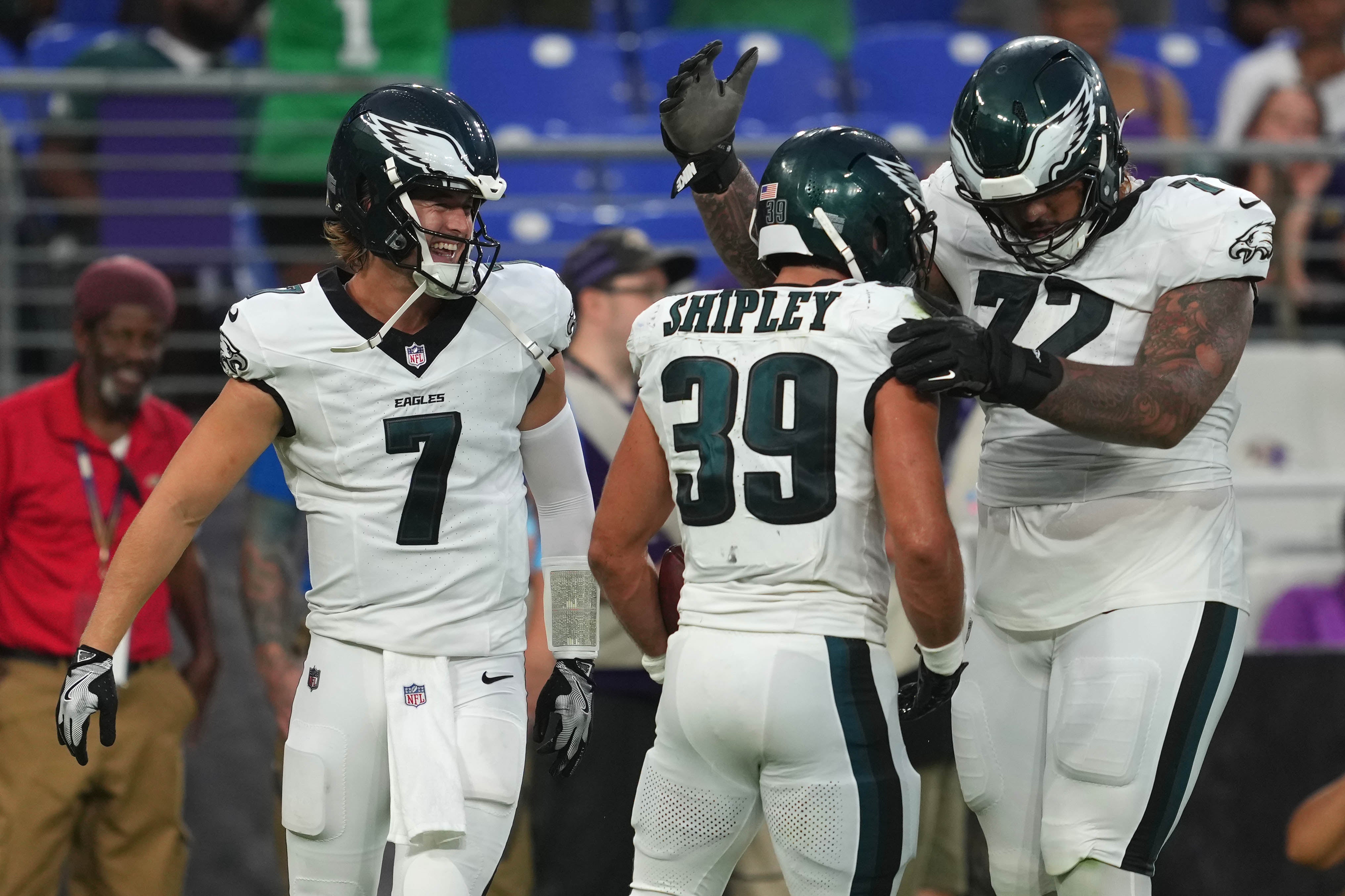 Philadelphia Eagles running back Will Shipley (39) celebrates his first quarter touchdown with quarterback Kenny Pickett (7) and tackle Darian Kinnard (72) against the Baltimore Ravens at M&T Bank Stadium.