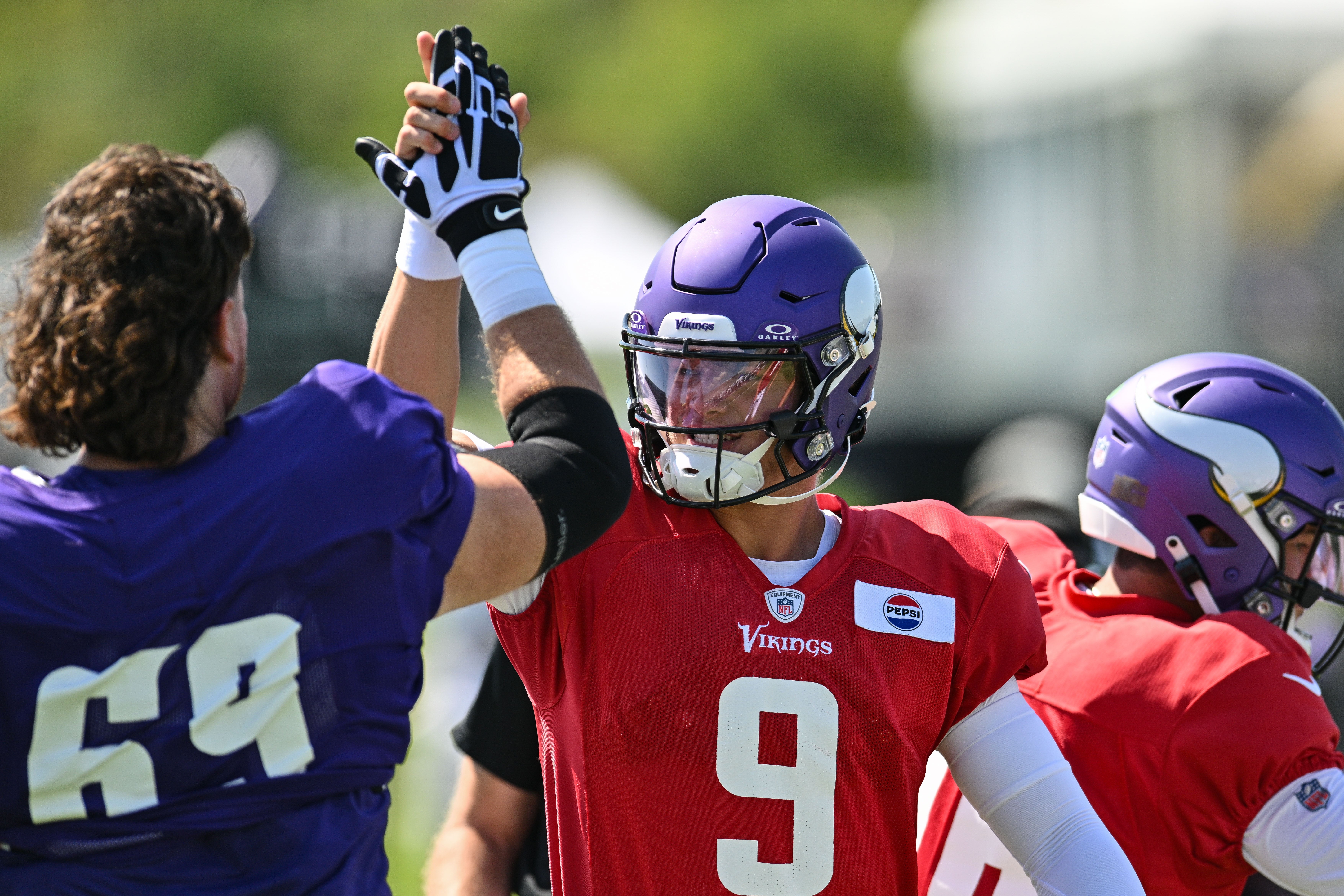 JJ McCarthy Dan Feeney Vikings