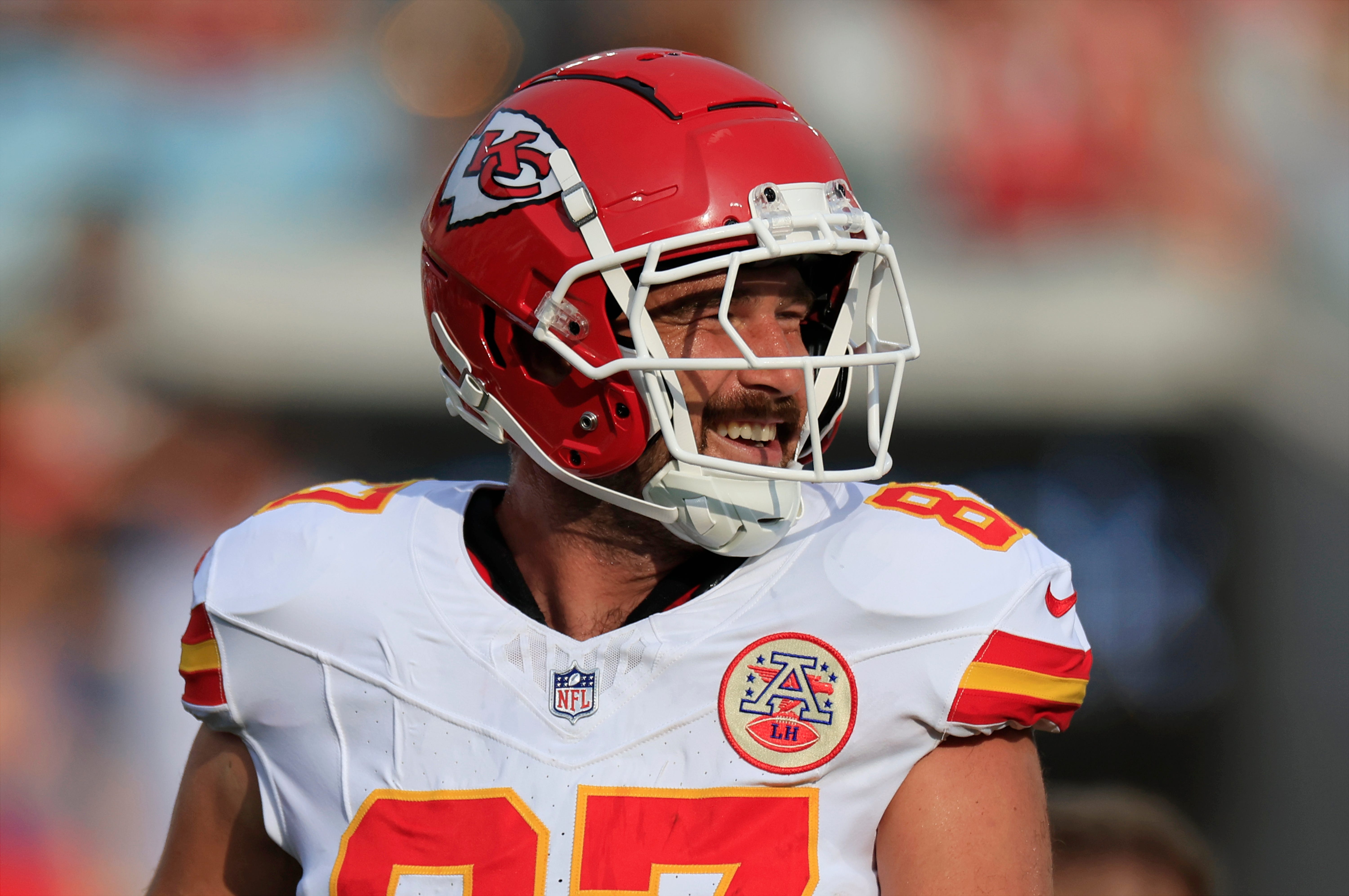 Kansas City Chiefs tight end Travis Kelce (87) smiles before a preseason NFL football game Saturday, Aug. 10, 2024 at EverBank Stadium in Jacksonville, Fla.