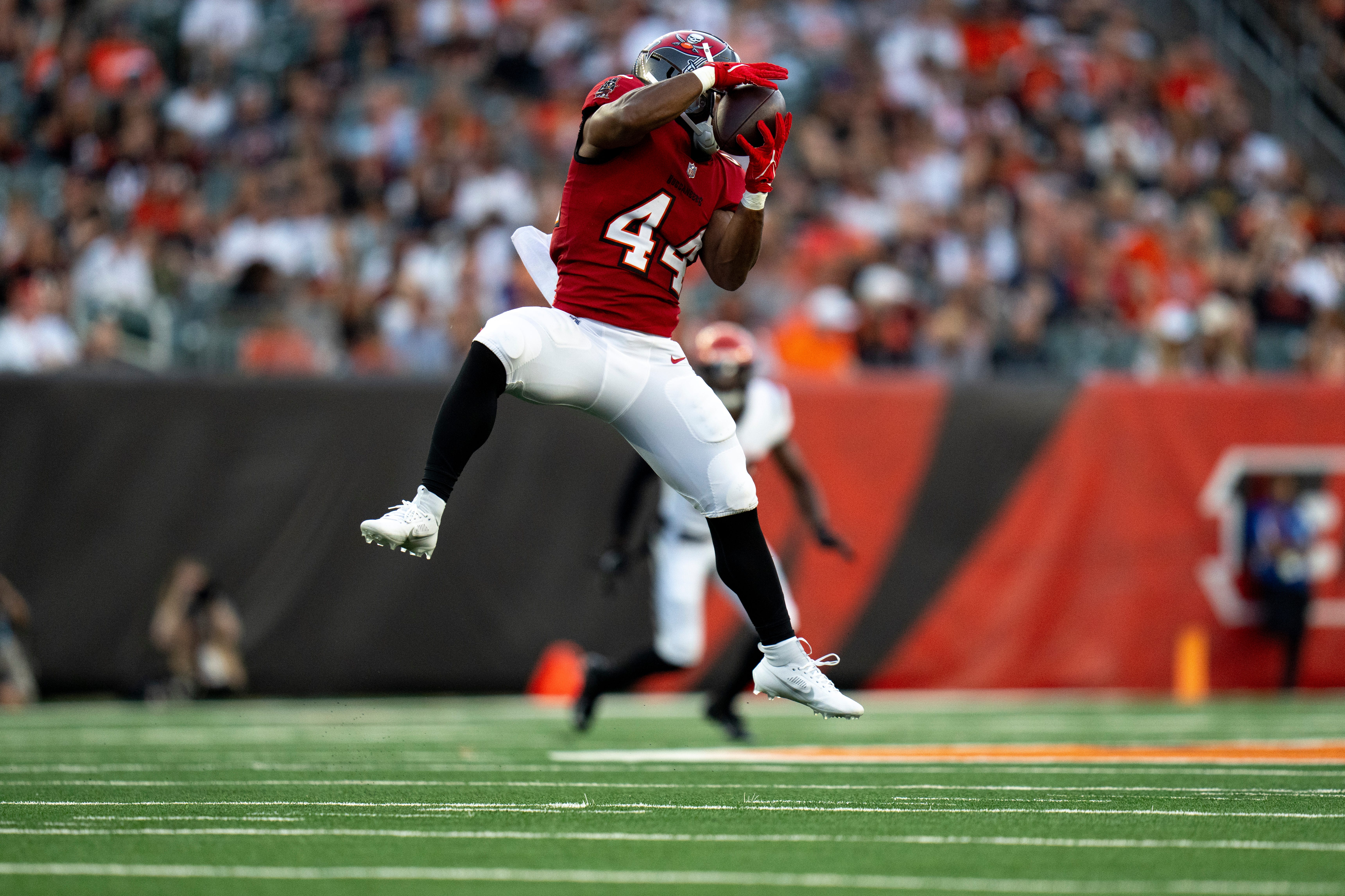 Tampa Bay Buccaneers running back Sean Tucker (44) makes a catch in the second quarter of the NFL preseason game against the Cincinnati Bengals at Paycor Stadium in Cincinnati on Saturday, August 10, 2024.