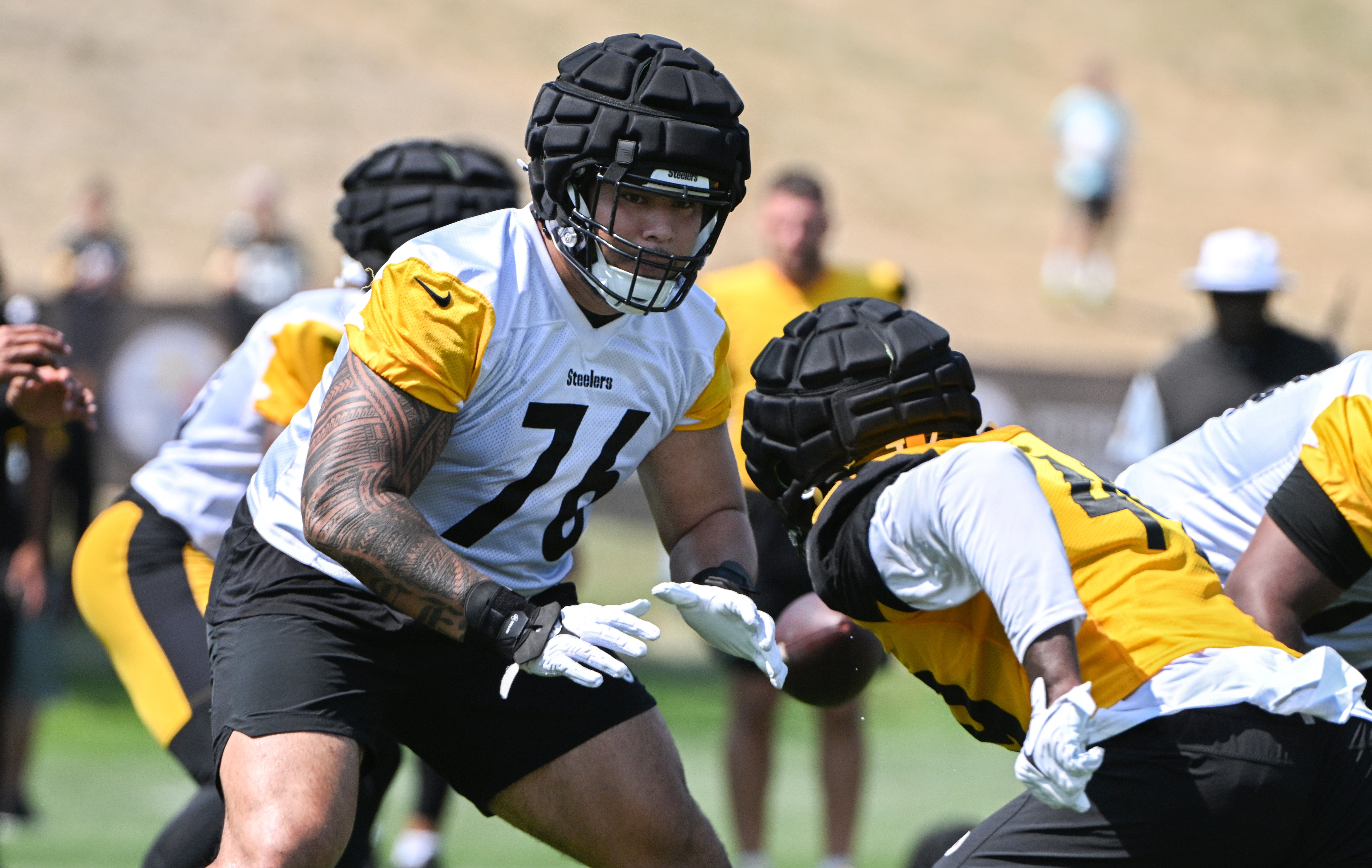 Jul 28, 2024; Latrobe, PA, USA; Pittsburgh Steelers offensive tackle Troy Fautanu (76) participates in drills during training camp at Saint Vincent College. Mandatory Credit: Barry Reeger-USA TODAY Sports