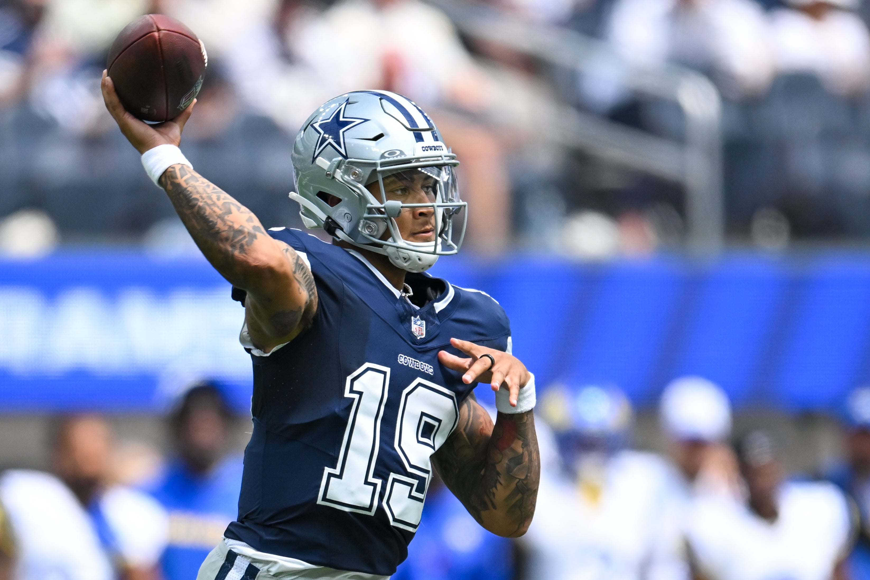 Dallas Cowboys quarterback Trey Lance (19) throws a pass against the Los Angeles Rams during the second quarter at SoFi Stadium.