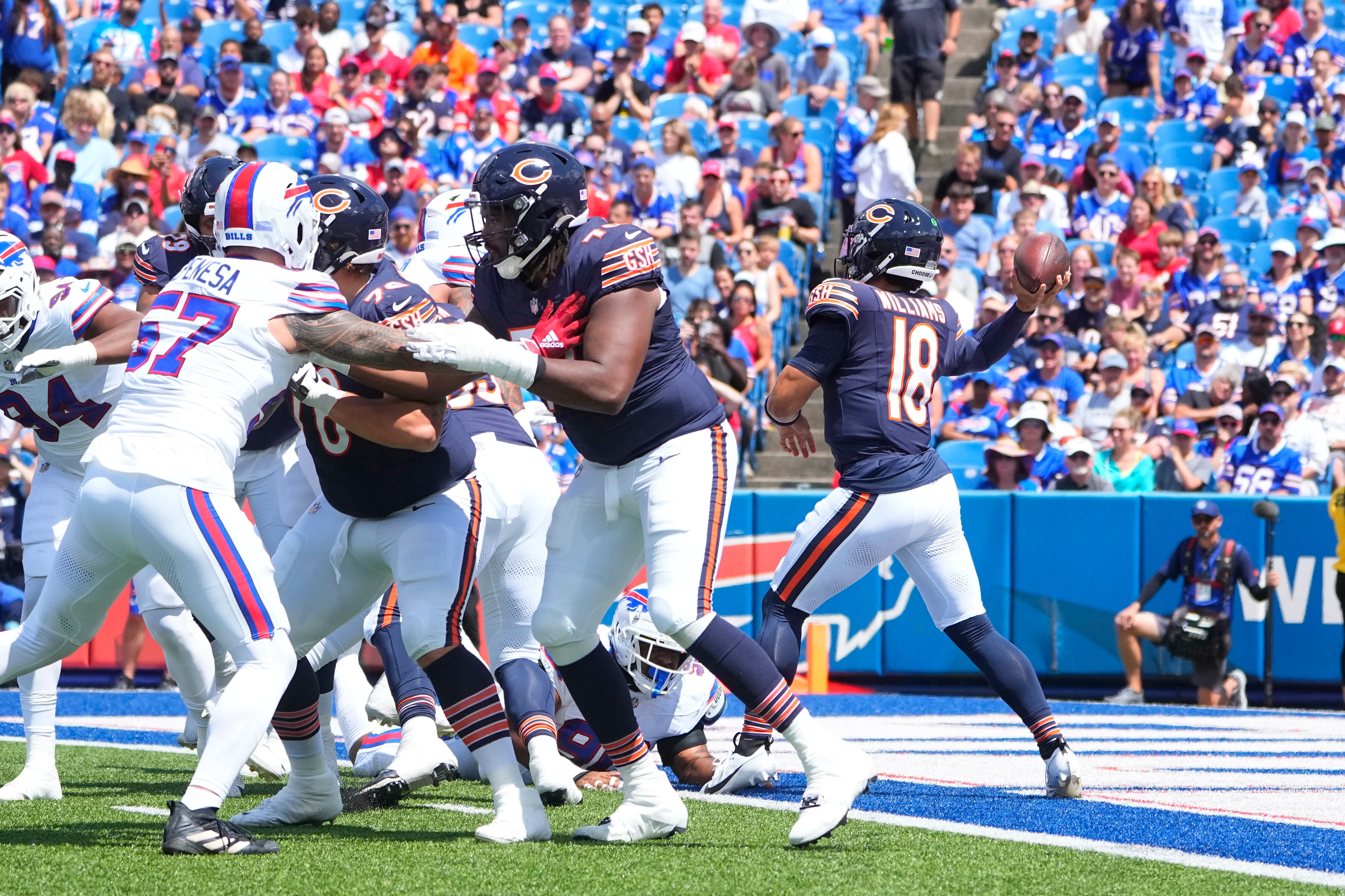 Aug 10, 2024; Orchard Park, New York, USA; Chicago Bears quarterback Caleb Williams (18) throws the ball against the Buffalo Bills during the first half at Highmark Stadium.