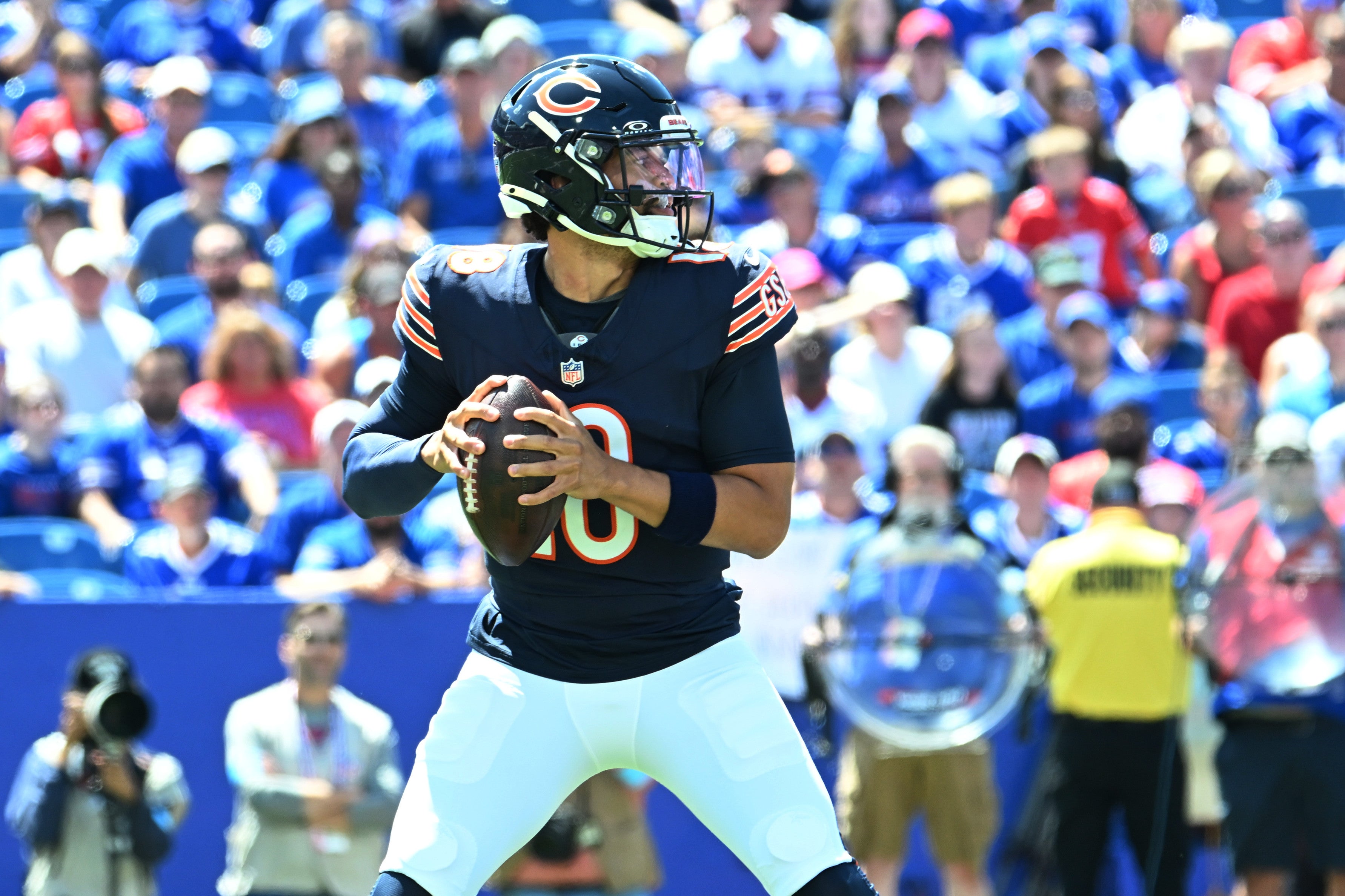 Aug 10, 2024; Orchard Park, New York, USA; Chicago Bears quarterback Caleb Williams (18) prepares for a pass in the first quarter of a pre-season game against the Buffalo Bills at Highmark Stadium.