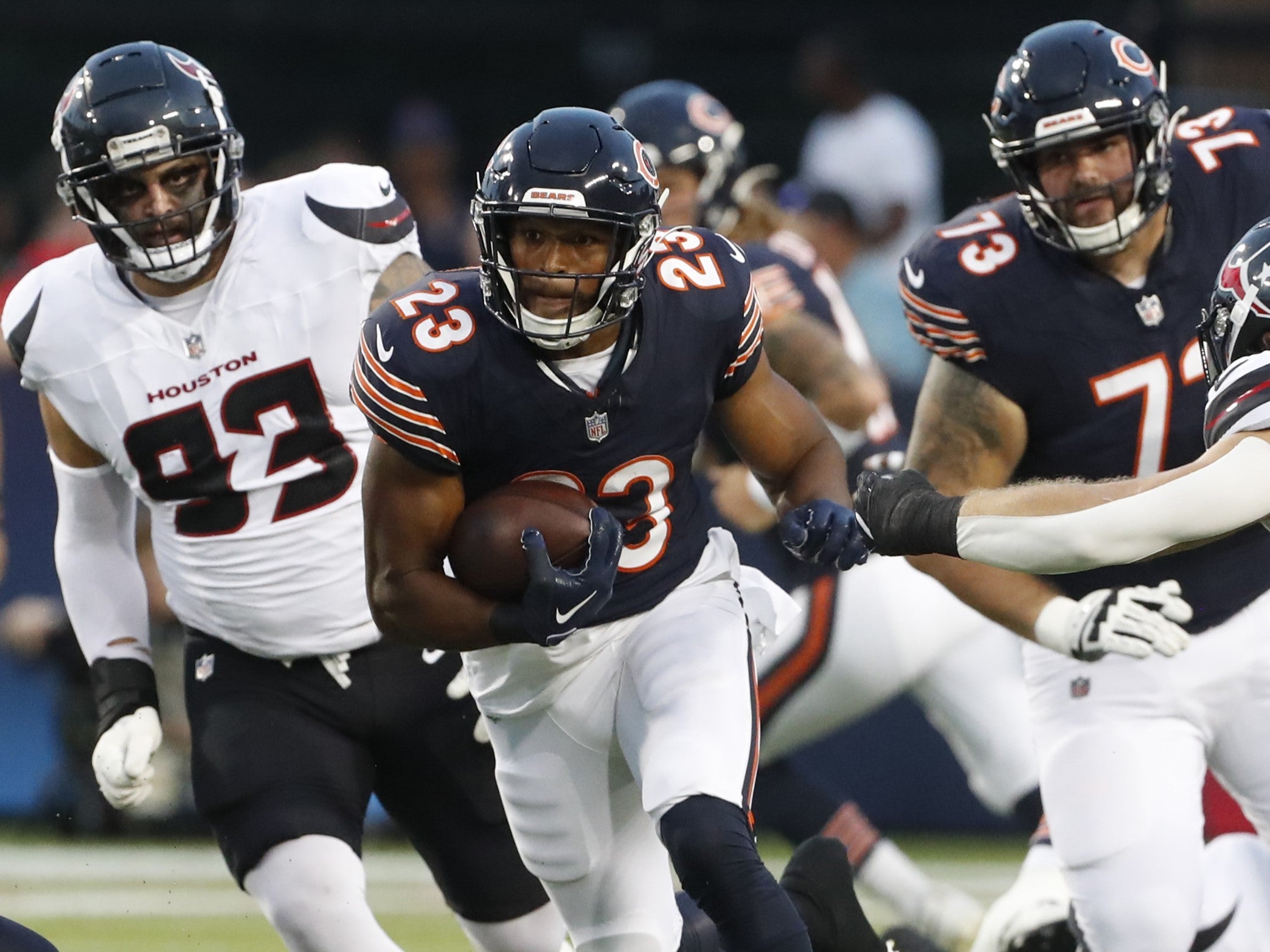 Aug 1, 2024; Canton, Ohio, USA; Chicago Bears running back Roschon Johnson (23) rushes the ball against he Houston Texans during the first quarter at Tom Benson Hall of Fame Stadium.