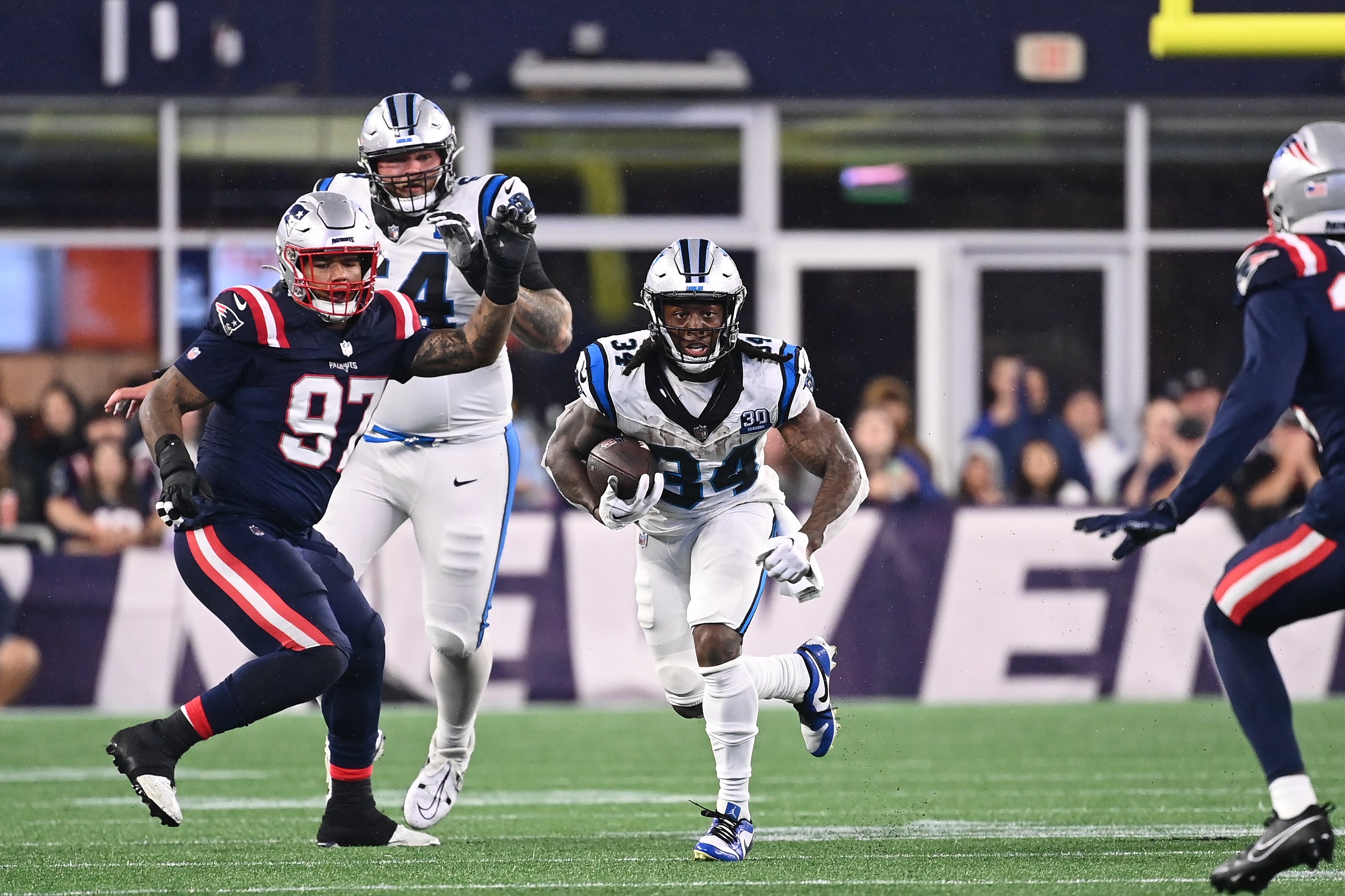 August 8, 2024; Foxborough, MA, USA; Carolina Panthers running back Mike Boone (34) runs the all during the first half against the New England Patriots at Gillette Stadium. Mandatory Credit: Eric Canha-USA TODAY Sports
