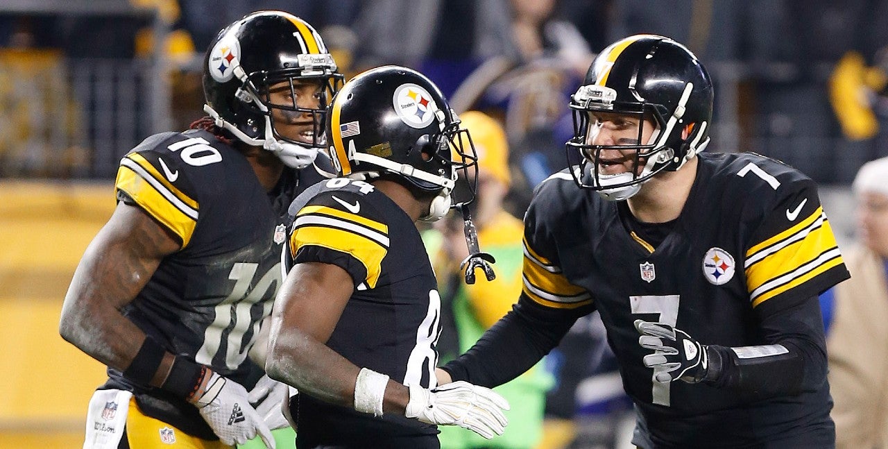 Jan 3, 2015; Pittsburgh, PA, USA; Pittsburgh Steelers wide receiver Antonio Brown (84) celebrates with Steelers quarterback Ben Roethlisberger (7) and Steelers wide receiver Martavis Bryant (10) after making a catch against the Baltimore Ravens in the second half during the 2014 AFC Wild Card playoff football game at Heinz Field. The Ravens won 30-17. Mandatory Credit: Geoff Burke-USA TODAY Sports