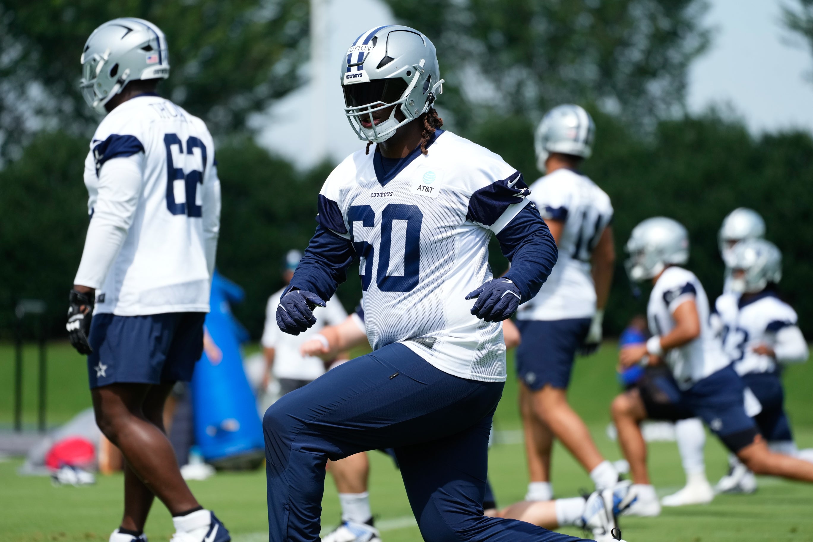 Dallas Cowboys tackle Tyler Guyton (60) goes through a drill during practice at the Ford Center at the Star Training Facility in Frisco, Texas.