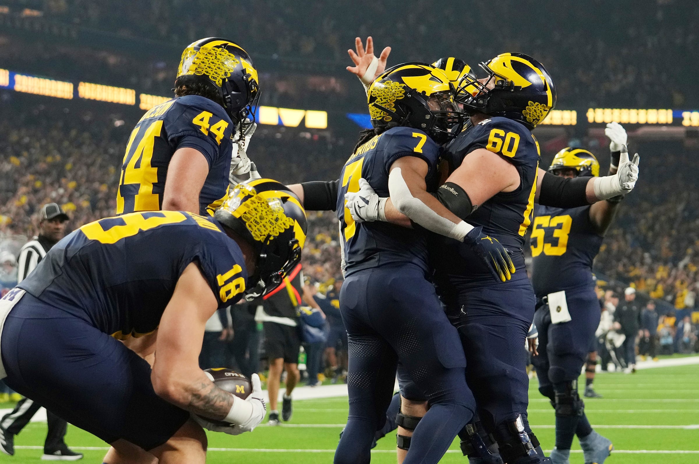 Donovan Edwards celebrates with teammates after a touchdown