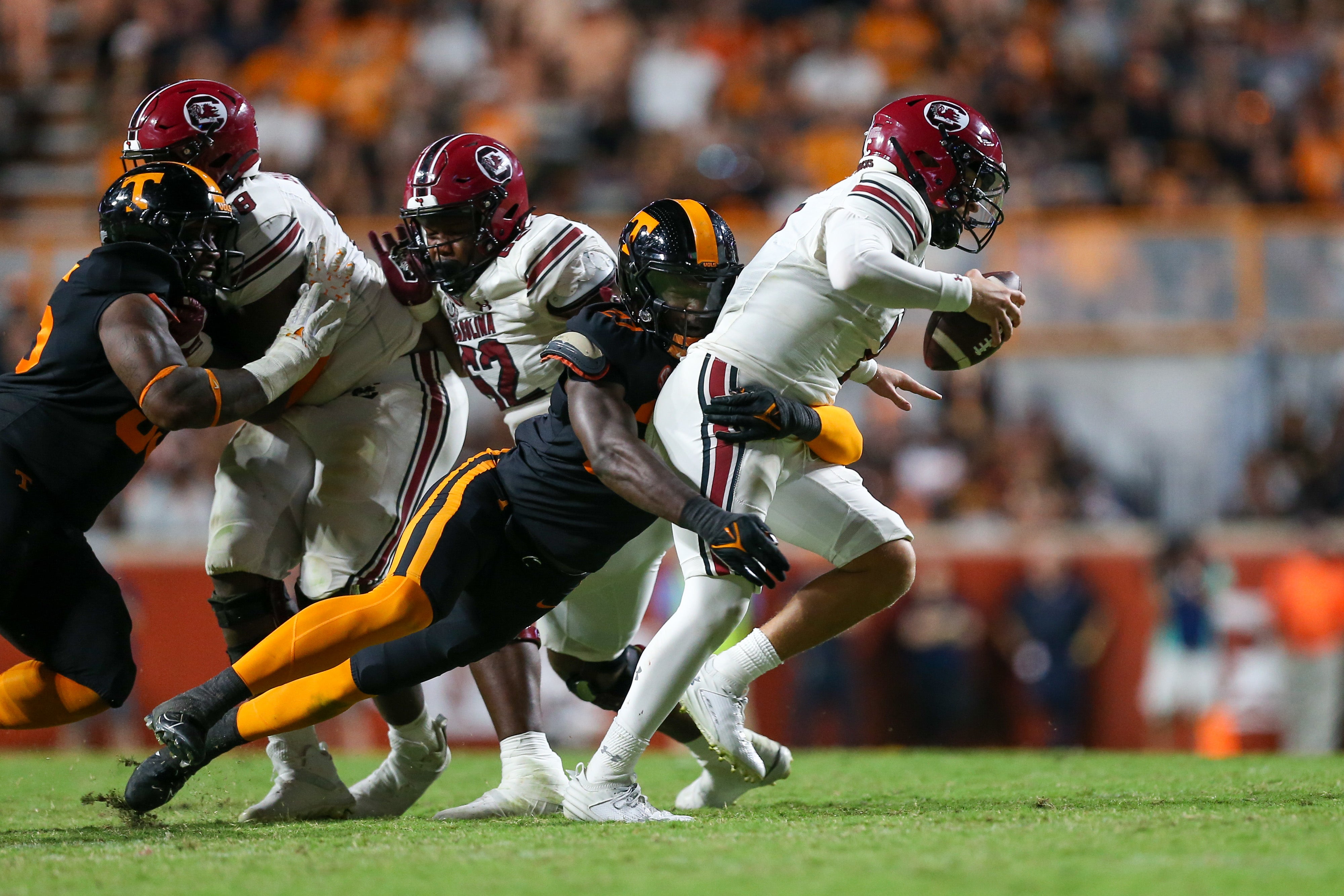 Sep 30, 2023; Knoxville, Tennessee, USA; Tennessee Volunteers defensive lineman James Pearce Jr. (27) sacks South Carolina Gamecocks quarterback Spencer Rattler (7) during the second half at Neyland Stadium.